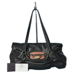 Sold at Auction: Prada Vintage Black Nylon Gold Top Handle Bag