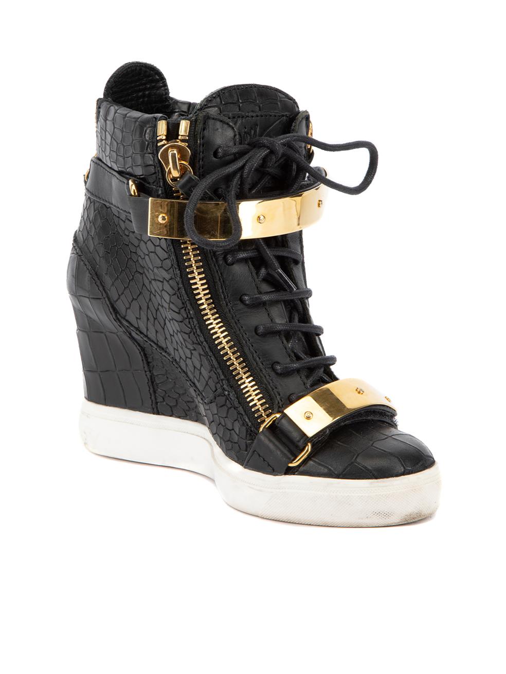 CONDITION is Very good.Hardly any visible wear to shoes is evident on this used Giuseppe Zanotti designer resale item.
 
 Details
  Black
 Leather
 High top trainers
 Crocodile embossed pattern
 Wedge heel
 Round toe
 Gold plate and zip accent
 Lace