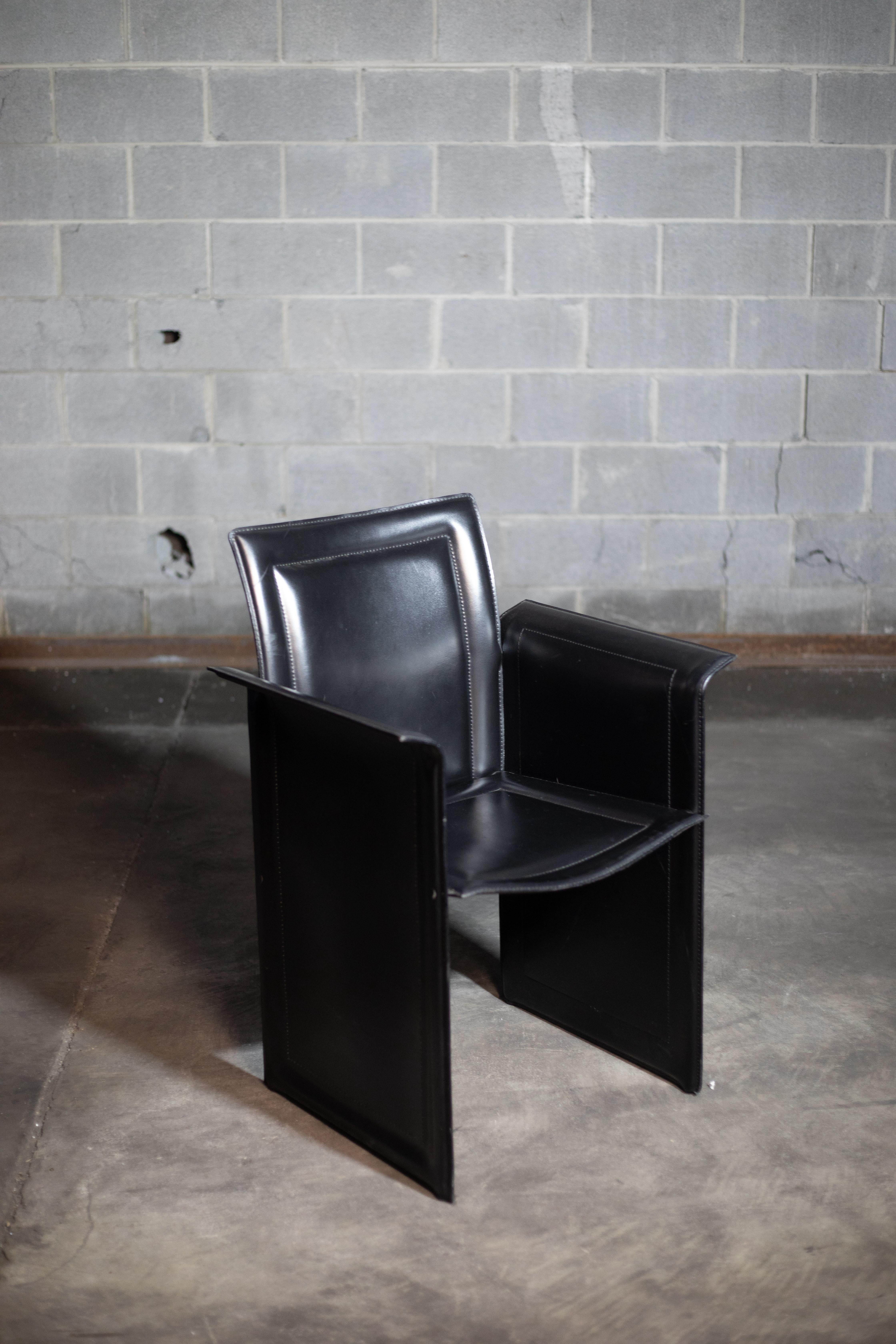 Set of 8 Black Leather Italian Chairs by Arrben. In good condition! 1970s. 