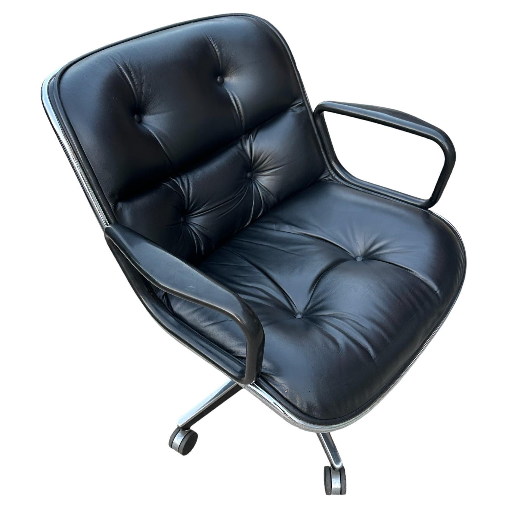 Classic black leather desk chair by Charles Pollock and manufactured by Knoll. Executed in black leather and steel base. No tears or missing buttons or screws. Leather in very good condition with even black color and sheen. Chrome tube in good