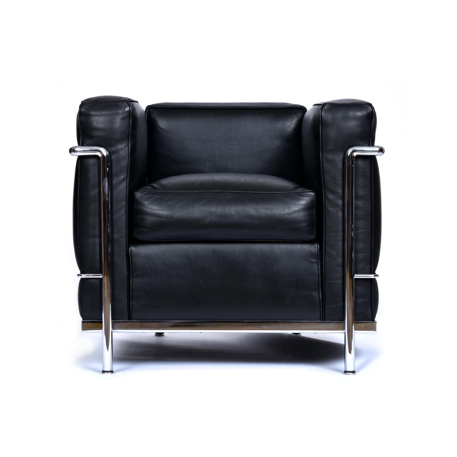 Each sold separately. (2) matching black leather and chrome Cassina Licensed LC2 Petit confort chairs by Atelier International available. Made in the USA. 

Thick, rich, smooth leather wraps the surprisingly comfortable cushions on this timeless
