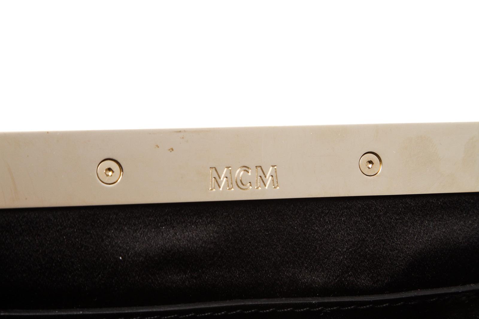 Black leather MCM clutch with gold-tone hardware and small crystal 2