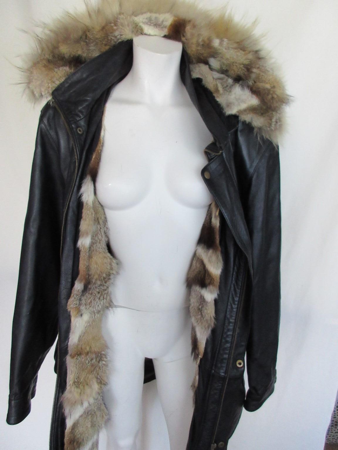 we offer more exclusive items, view our frontstore

Details:
Outside leather
hood with zipper
inside detachable fox fur lining with zipper
2 pockets/ 2 side pockets, closing zipper and 4 press buttons
Size is aprox. M/L please check