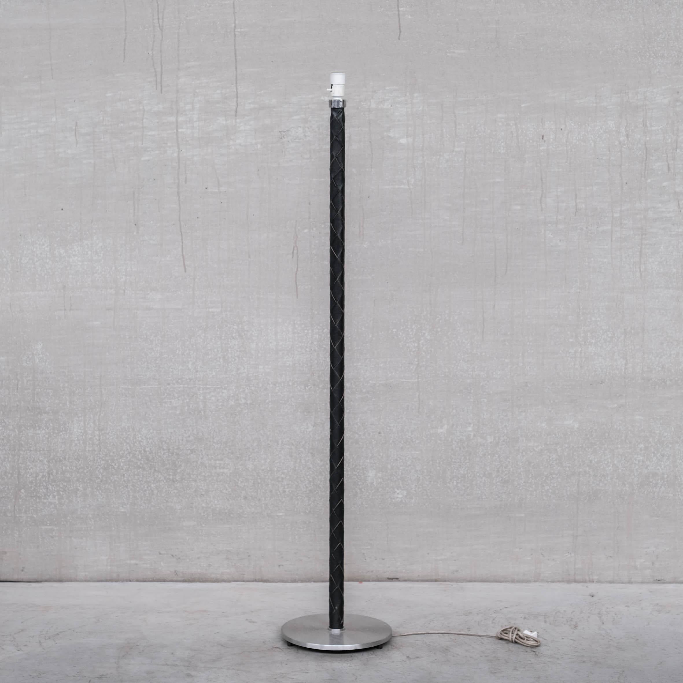 A good quality braided black leather floor lamp, over an aluminium base. 

Denmark, c1968. 

Designed by Jo Hammerbog for Fog and Morup. 

'Flet' model'.

Good vintage condition. 

Since re-wired and PAT Tested.

Location: Belgium Gallery.