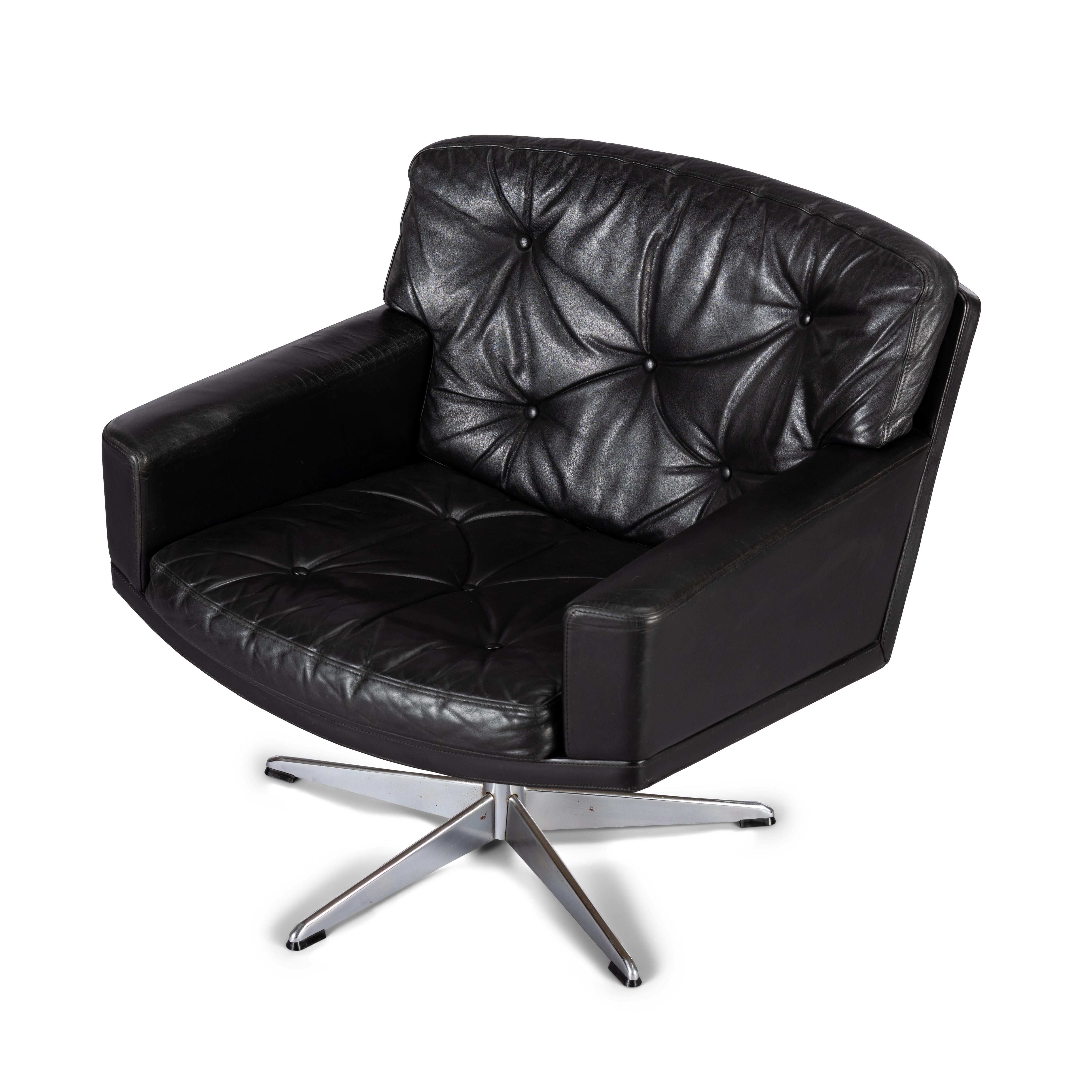 Mid-Century Modern black leather and chromed metal Danish 'Mama' swivel chair that will make Lita Ford drool. All is still in fully original condition and upholstery. The leather is in remarkable condition with just the right vintage patina everyone