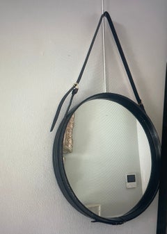Black Leather Mirror Covered by Hermès  Designed by Jacques Adnet, France 1950.