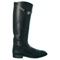 Black leather riding boots with silver metal hardware Hermès 