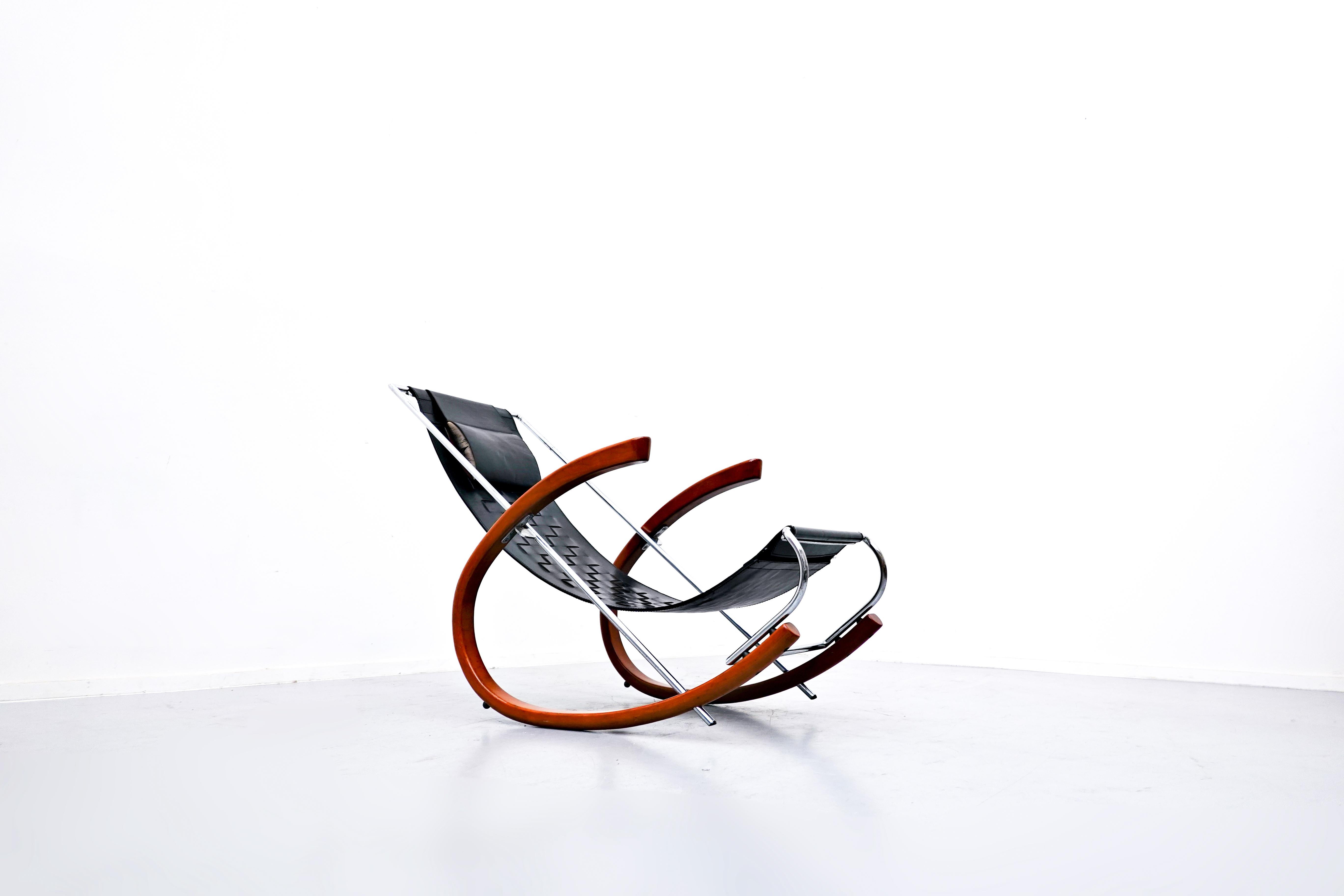 Black leather rocking chair model 'Donna' by Elio di Franco for Zanotta - 1988.