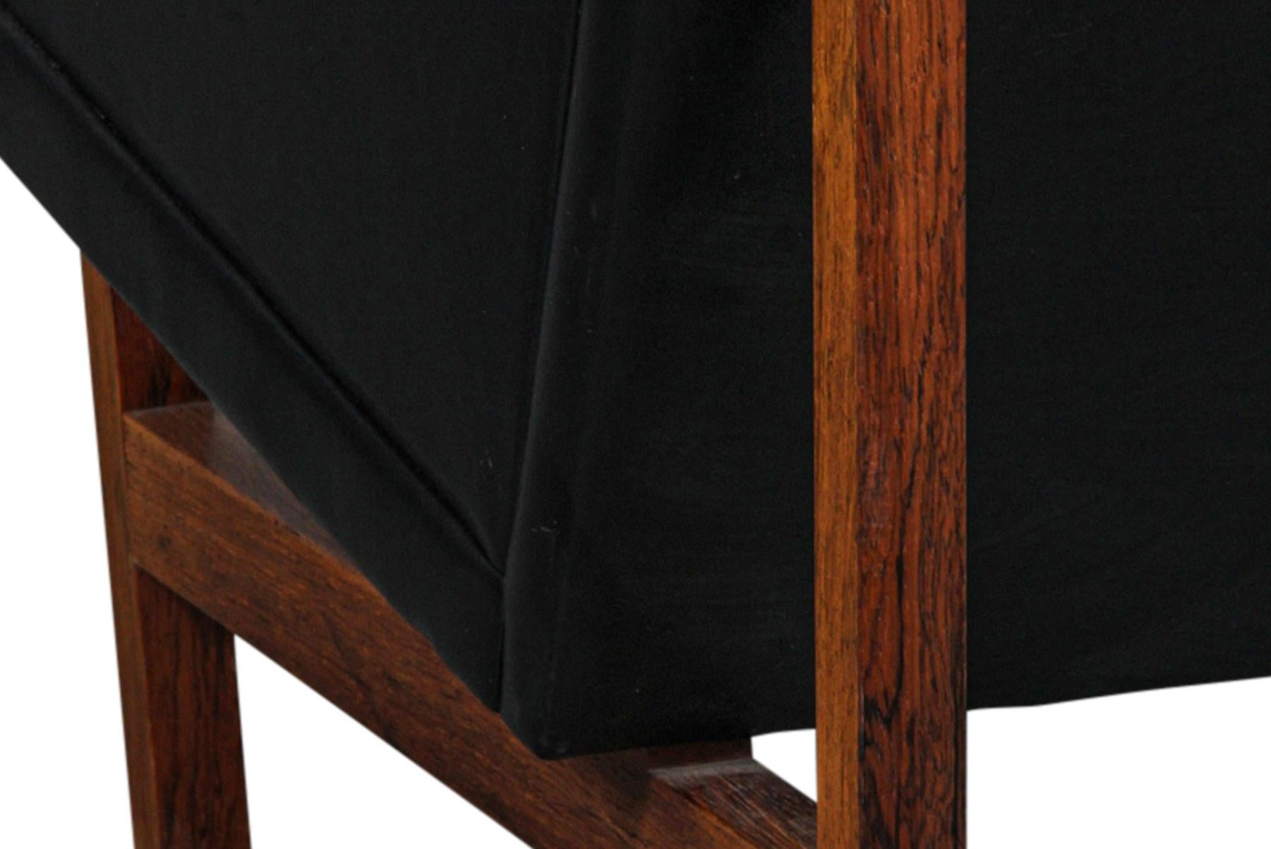 Origin: Denmark
Designer: Svend Ellekaer
Manufacturer: Henry Rolschau Møbler
Era: 1960s
Materials: Rosewood, leather
Measurements: 55? wide —

Condition:
In excellent original condition.