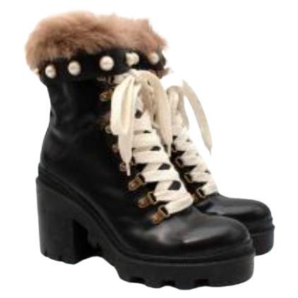 Black leather shearling trimmed combat boots For Sale