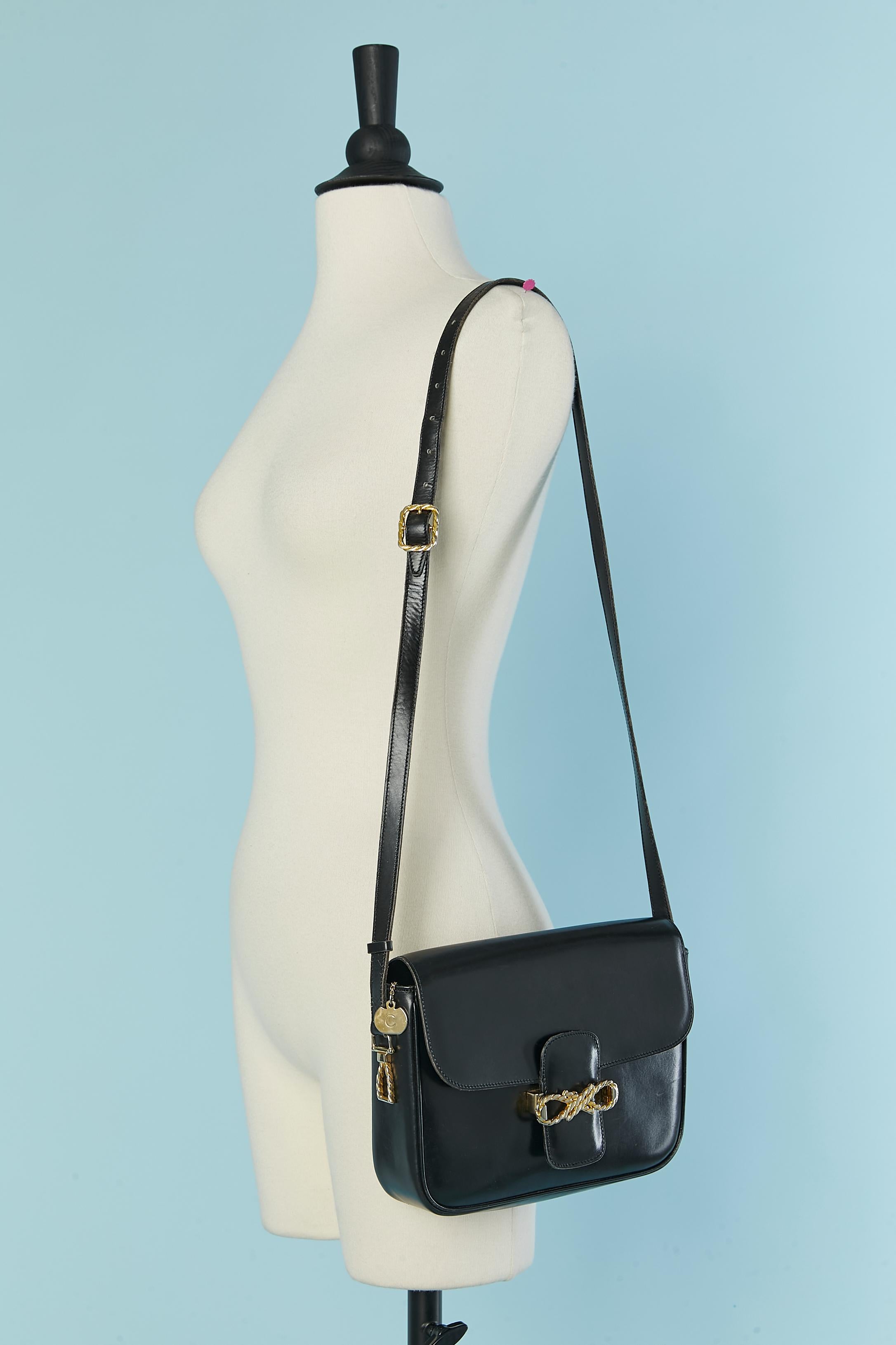 Black leather shoulder bag with gold metal hardware Céline Circa 1970's For Sale 1