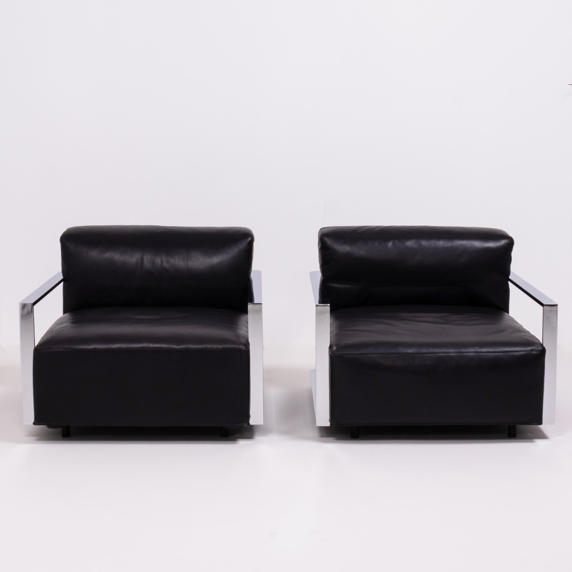 Designed by Arik Levy for Baleri Italia in 2008, the St Martin Armchairs are sleek yet comfortable.

Featuring an angular polished chrome frame, the modular chairs have separate back and seat cushions upholstered in soft black leather.