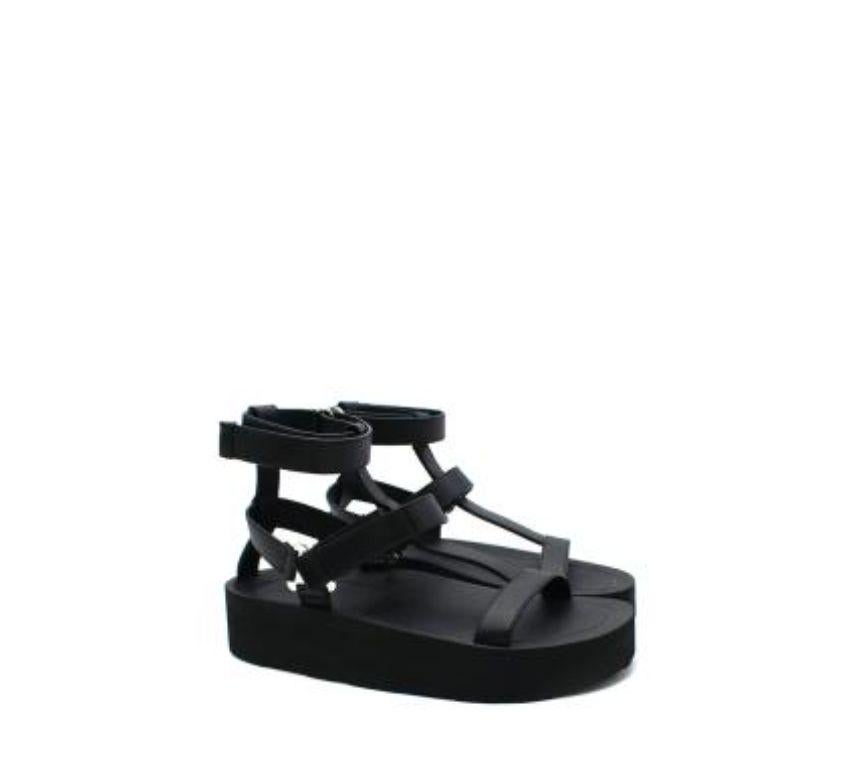 Hermes Black Leather Strap Sandals
 
 Techno-sandal in calfskin with iconic H Diamant buckle.
 A light and comfortable sole, perfect for summer.
 
 Black rubber sole
 Black calfskin lining
 
 Made in Italy