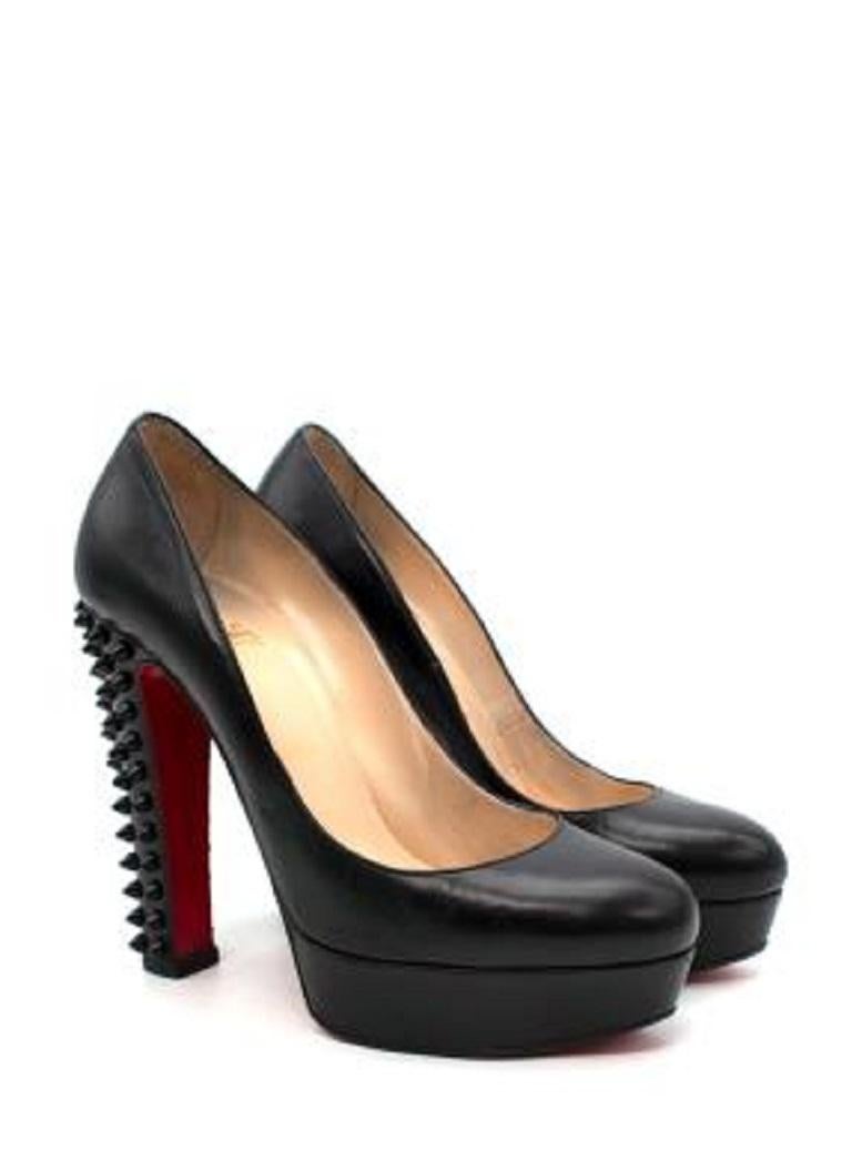  Christian Louboutin Black Leather Studded Block Heeled Pumps
 
 - Block heeled pump with tonal black studs adorning the heel
 
 Materials: 
 Lamb Leather 
 
 9 very good condition, with some signs of wear- please use zoom to review
 
 PLEASE NOTE,