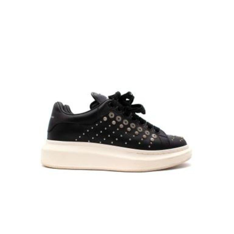 Alexander McQueen black leather studded Larry trainers
 

 - Signature Mcqueen in black leather with studded upper
 - Chunky white rubber platform 
 - Chunky cotton laces 
 

 Materials:
 Leather 
 Cotton 
 

 Made in Italy 
 

 9.5/10 excellent