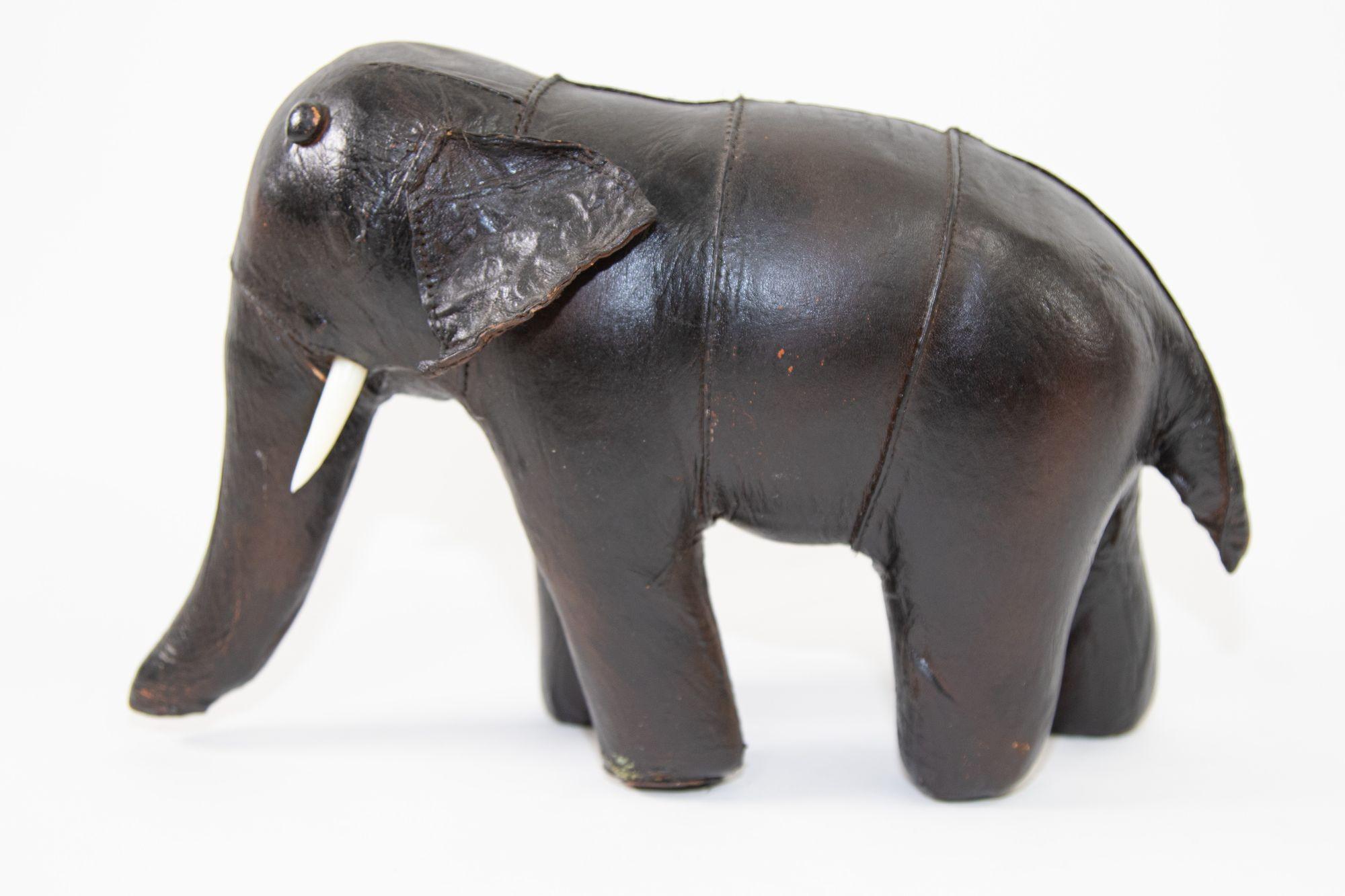 Hand-sewn black leather stuffed elephant figurine toy.
He will make a wonderful gift for anyone who loves elephants.
In the style of Dimitri Omersa's for Abercrombie and Fitch and Liberty England.
Unmarked, origin and designer unknown.
Circa