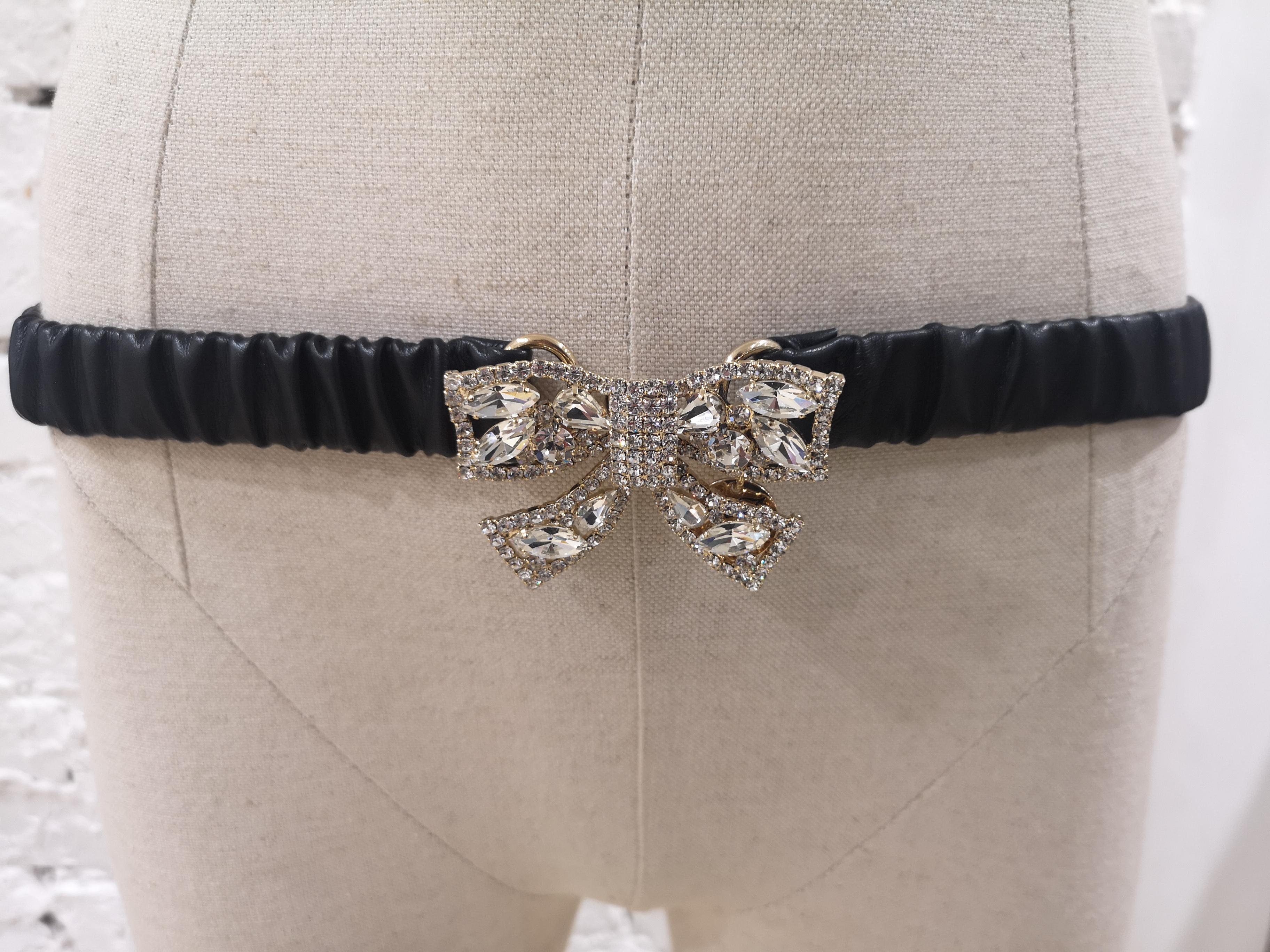 Black leather swarovski bow belt
totally made in italy
one size
