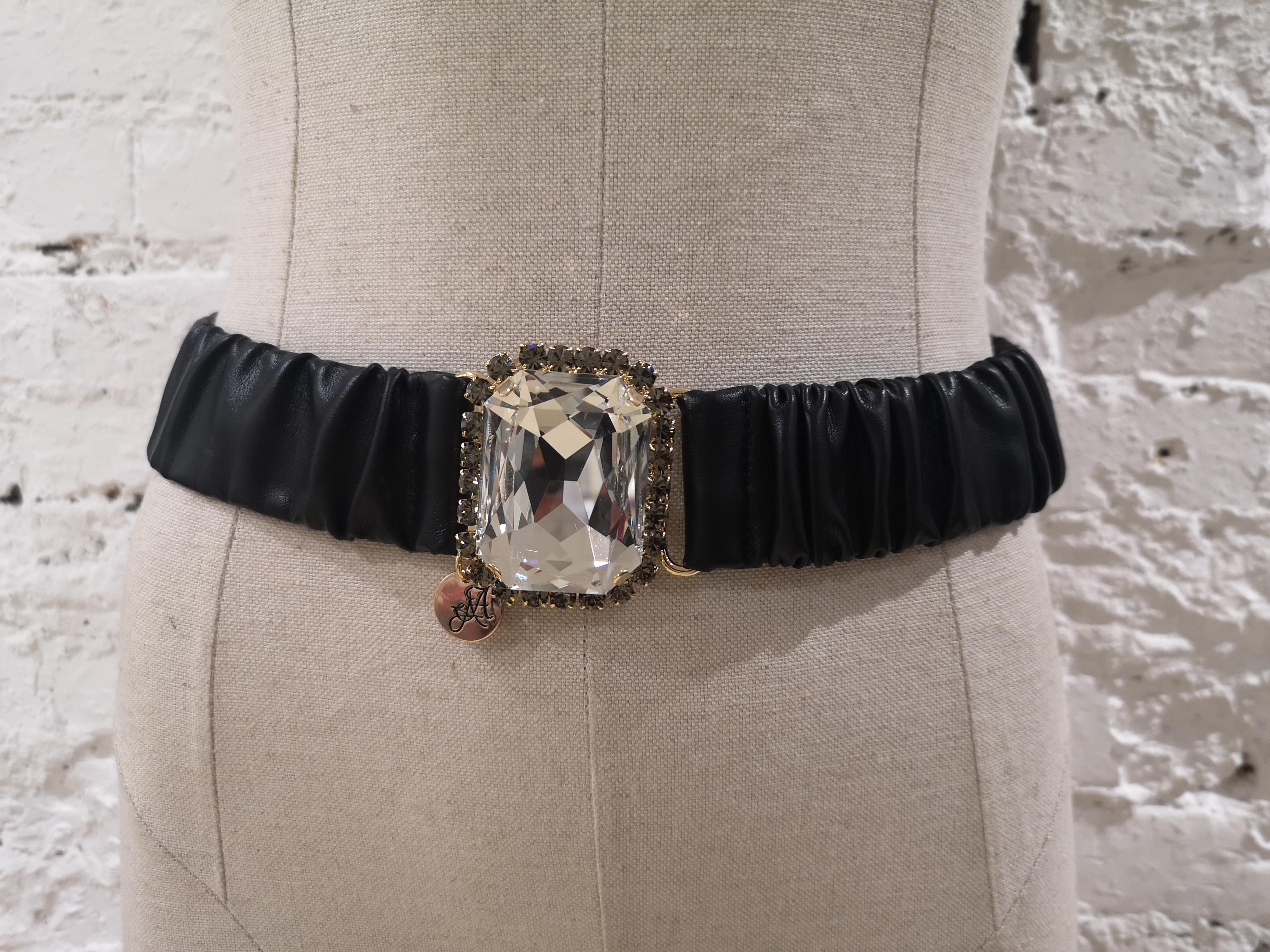 Black leather swarovski stone buckle belt
totally handmade in italy with real swarovski stone
one size