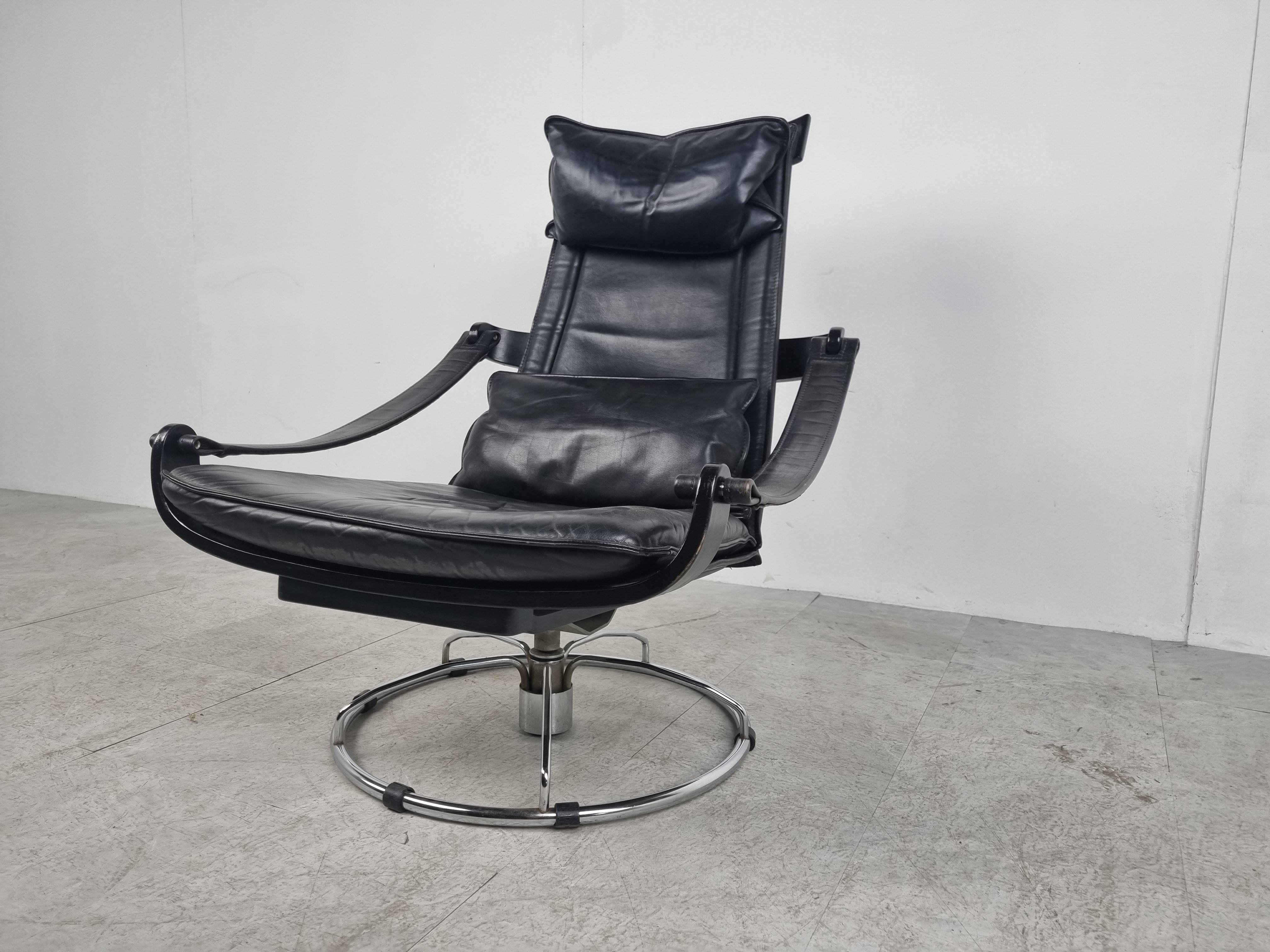 Swedish Black leather swivel chair by Ake Fribytter for Nelo Möbel, 1970s For Sale