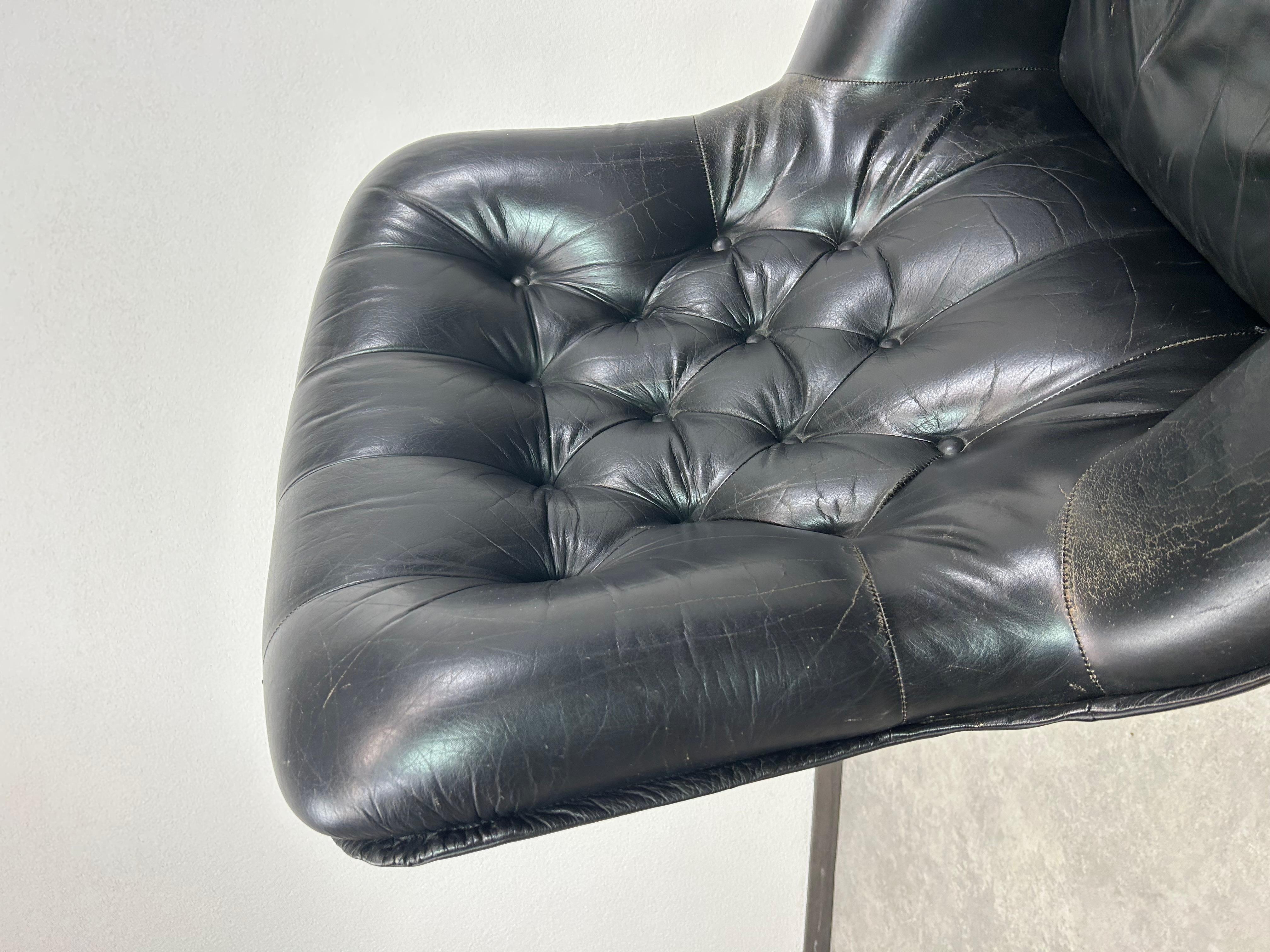 Leather Black leather swivel wingchair by PeeM For Sale