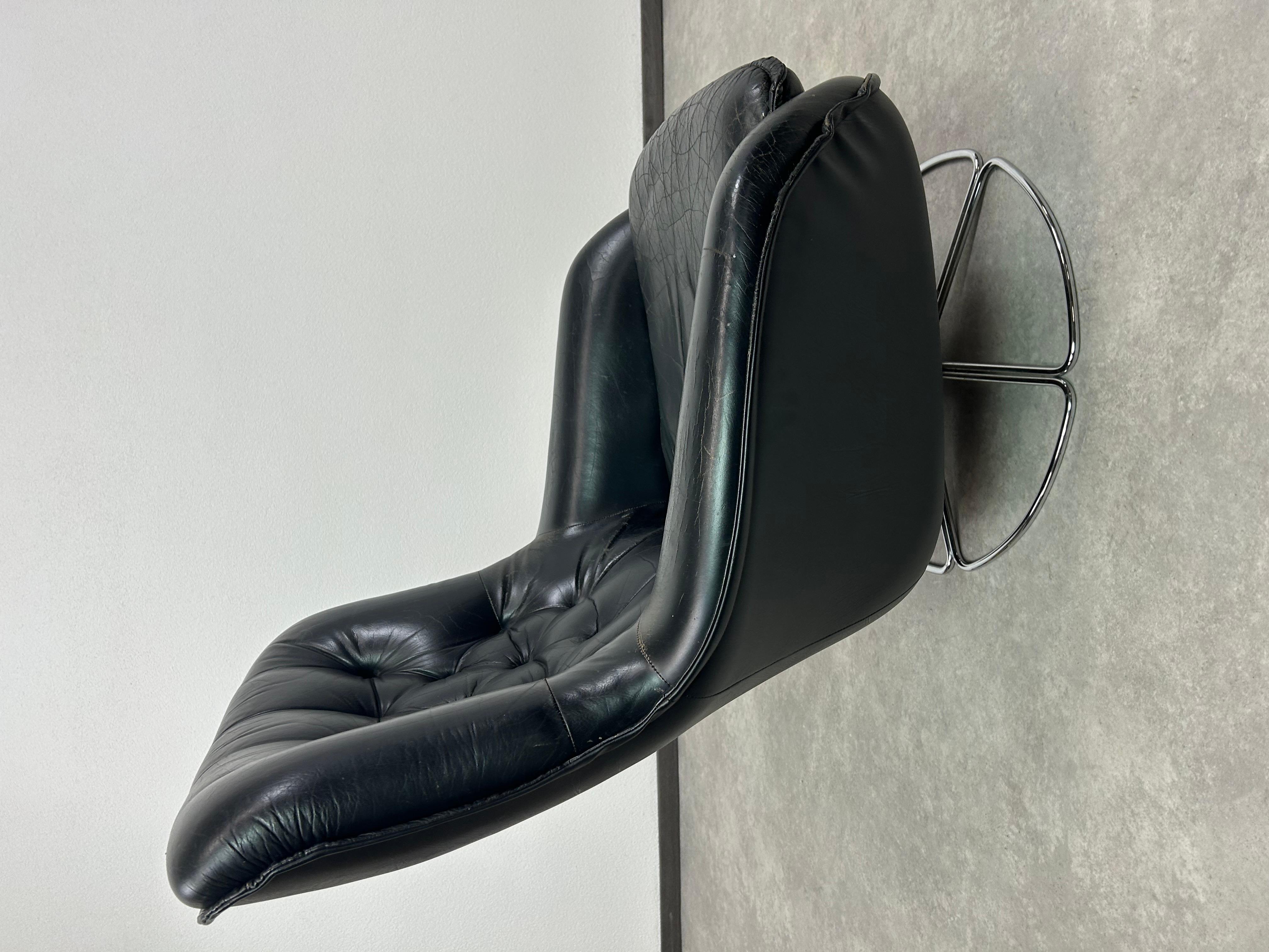 Black leather swivel wingchair by PeeM For Sale 1
