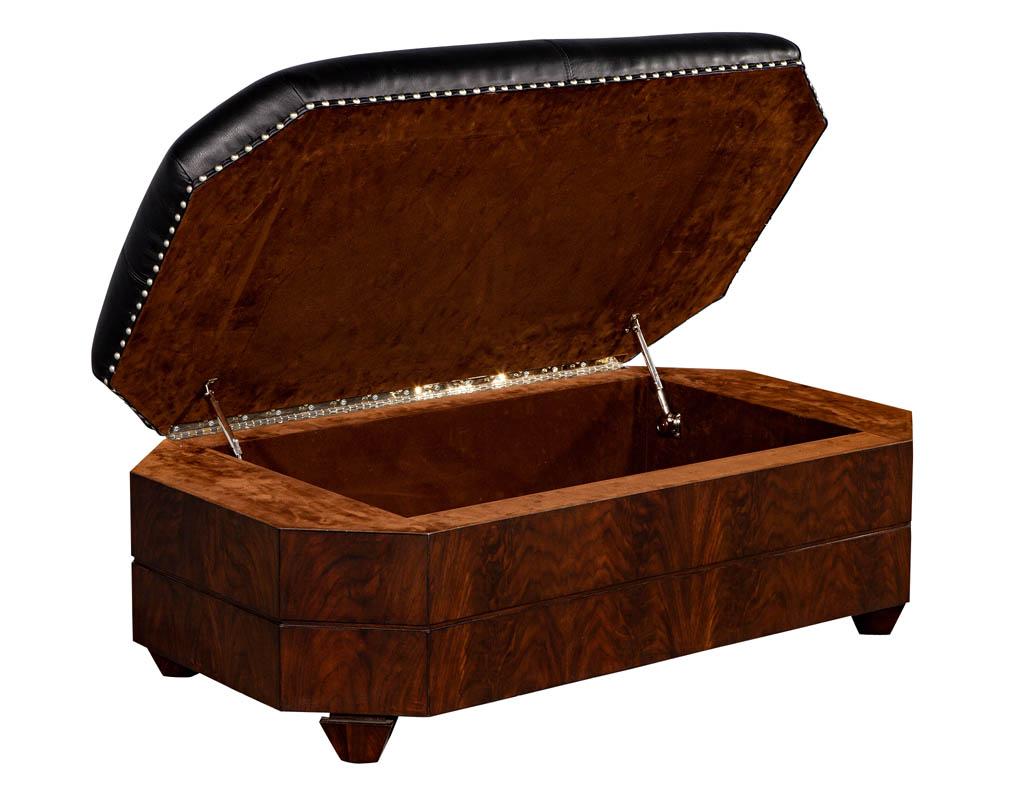 Black leather top storage ottoman by EJ Victor. Beautiful wood grains and black leather make this unique storage ottoman the perfect fit for your space.

Price includes complimentary scheduled curb side delivery to the continental USA.