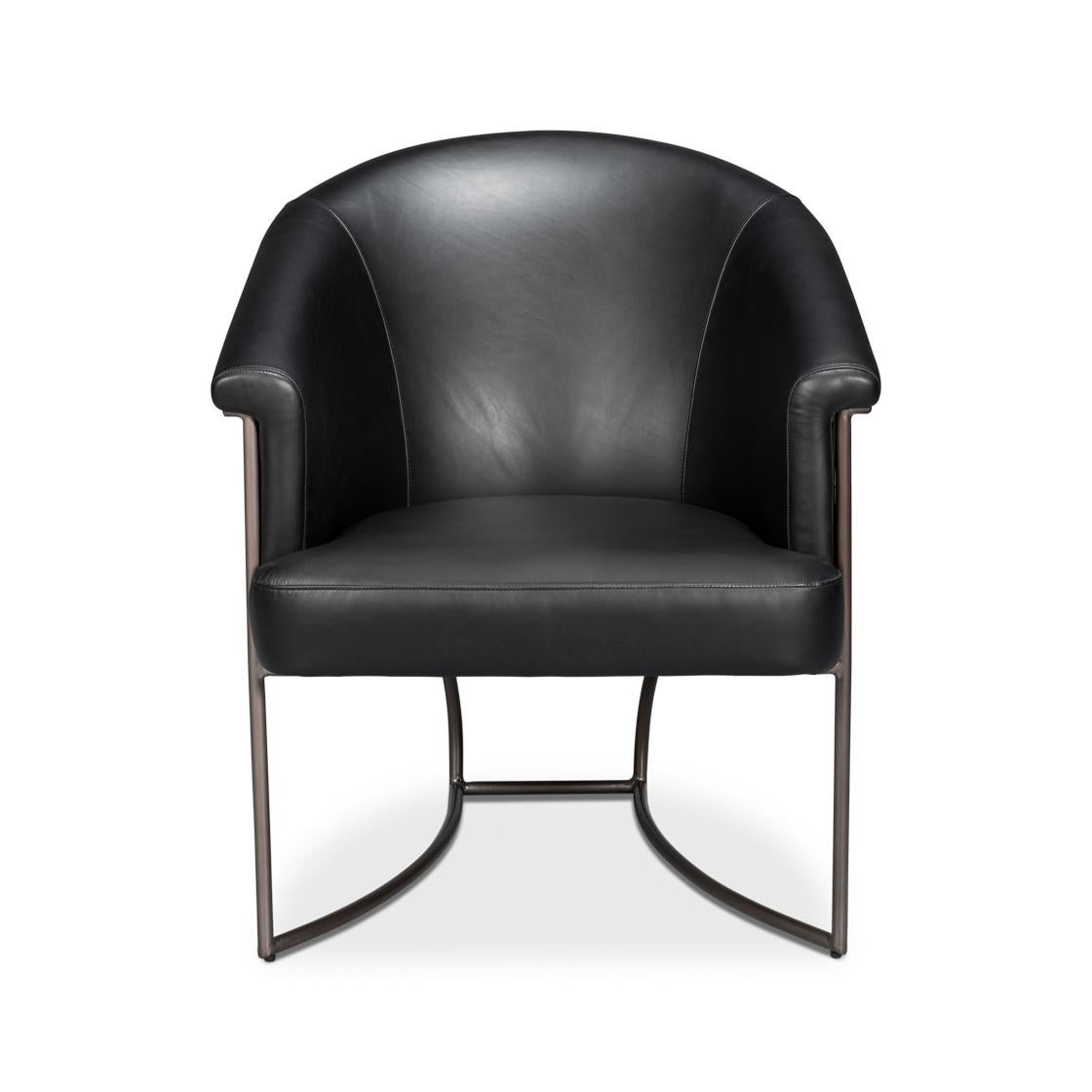 Upholstered in premium full-grain leather in onyx black, this chair exudes sophistication and timeless style. The curved tub silhouette provides ergonomic comfort, while the sleek iron frame adds a contemporary edge and sturdy support.

Perfect for