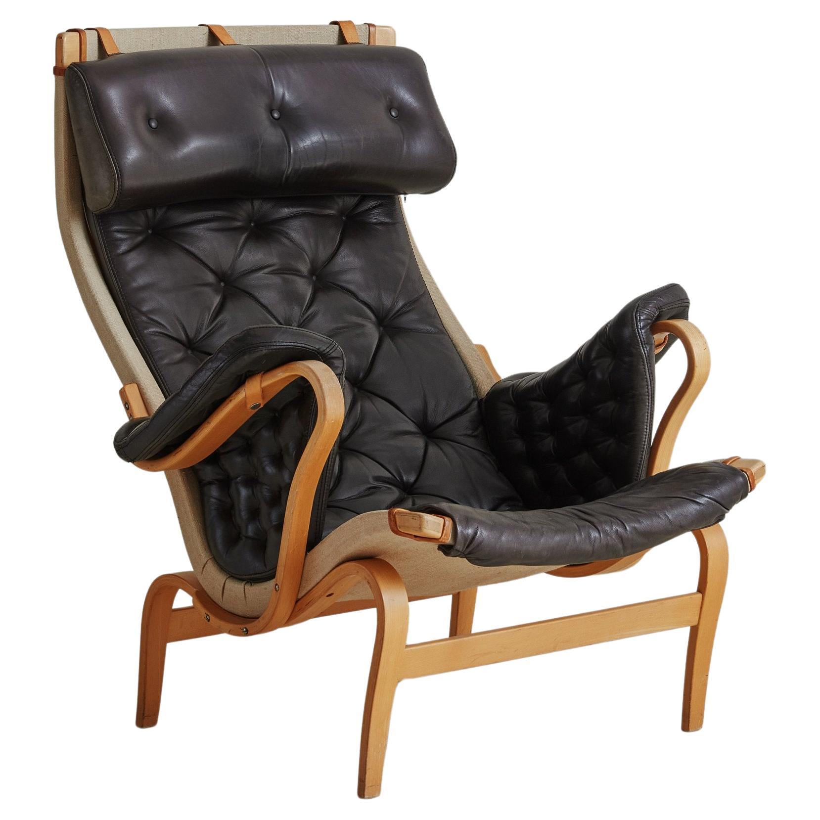 Black Leather Tufted 'Pernilla' Armchair by Bruno Mathsson for DUX, Sweden 1960s For Sale