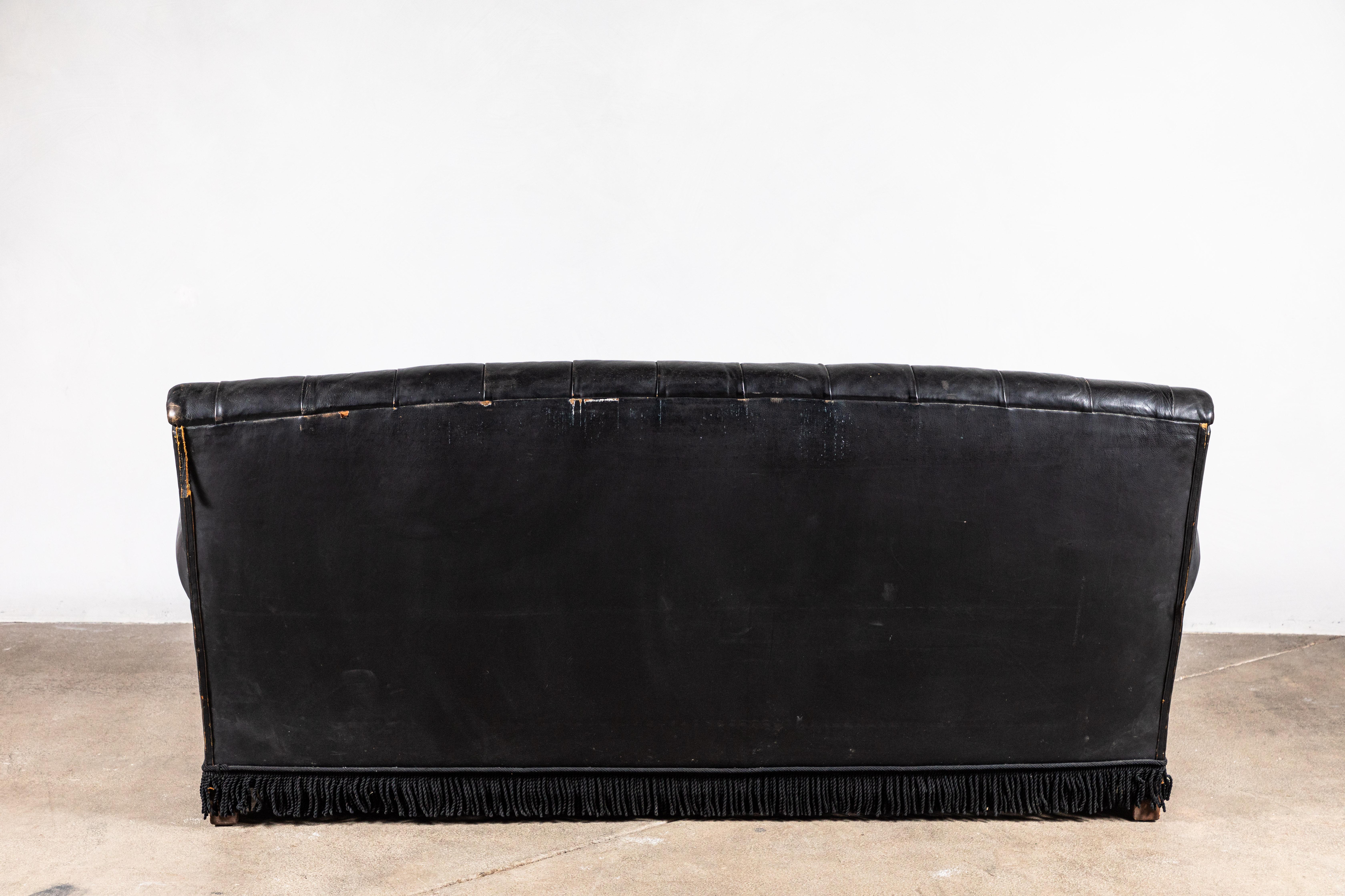 American Black Leather Tufted Sofa with Tufting and a Fringed Base