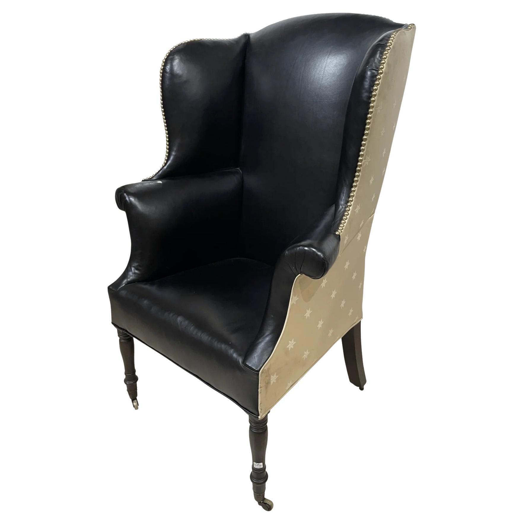 Black leather Upholstered English Regency wingback chair