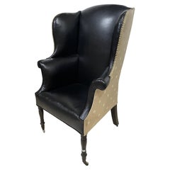 Black leather Upholstered English Regency wingback chair