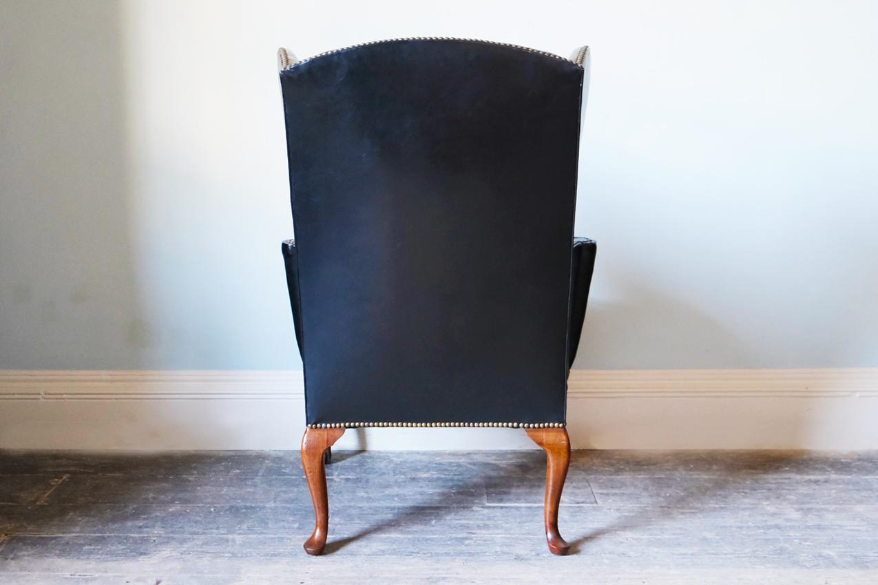 Georgian Black Leather-Upholstered Wingback Armchair with Ball & Claw Feet For Sale 1