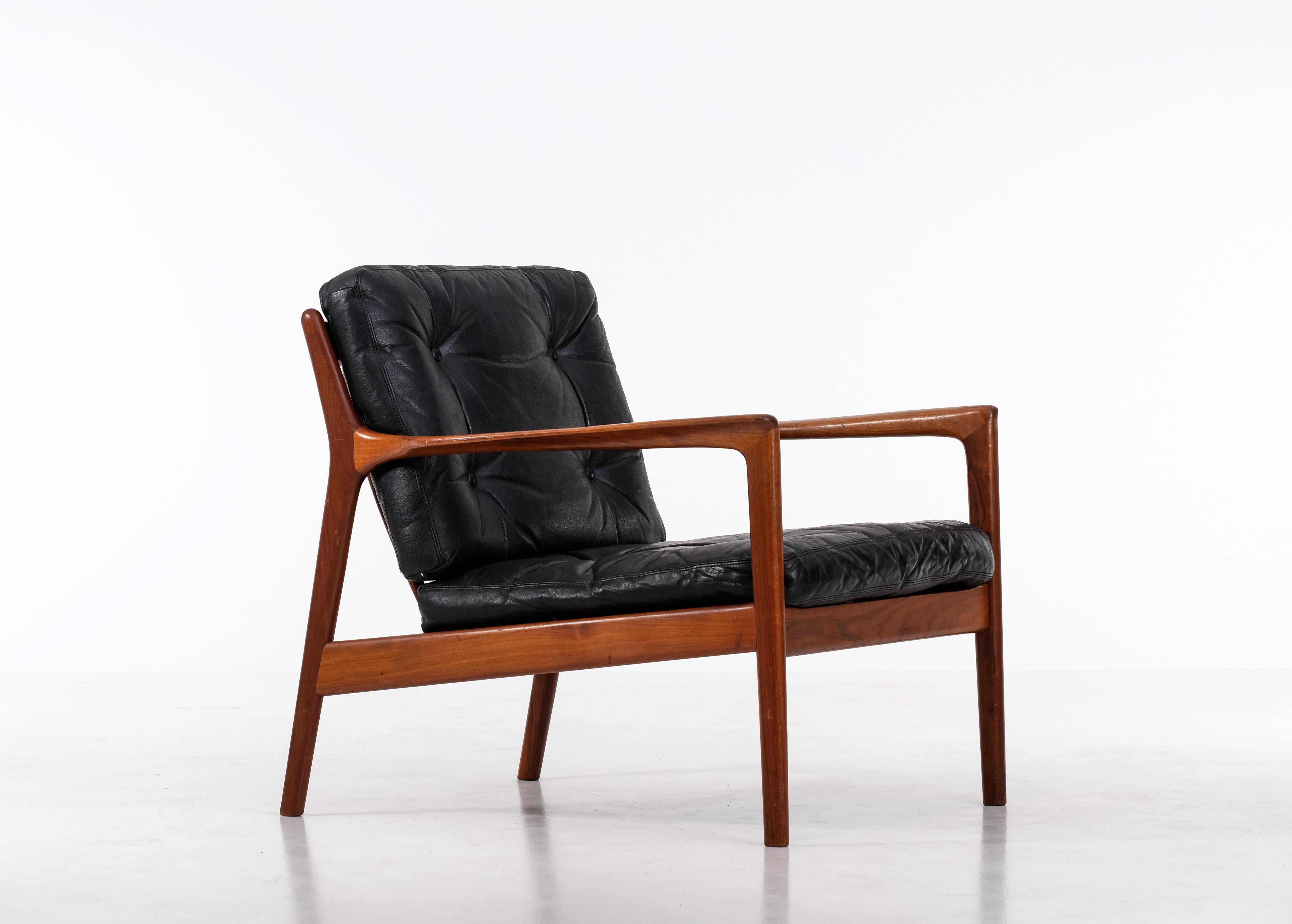 Schwedischer Sessel aus Nussbaumholz von Folke Ohlsson für DUX, Anfang der 1960er Jahre. Sehr guter Zustand.


 