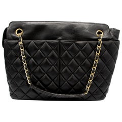 Black Leather Vintage Chanel with Leather and Gold Colored Chain Strap