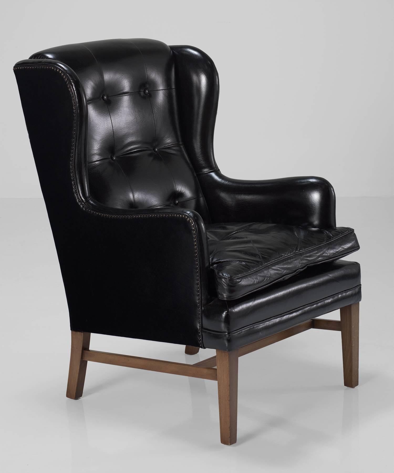 Mid-Century Modern Black Leather Wing Armchairs, Sweden, circa 1950