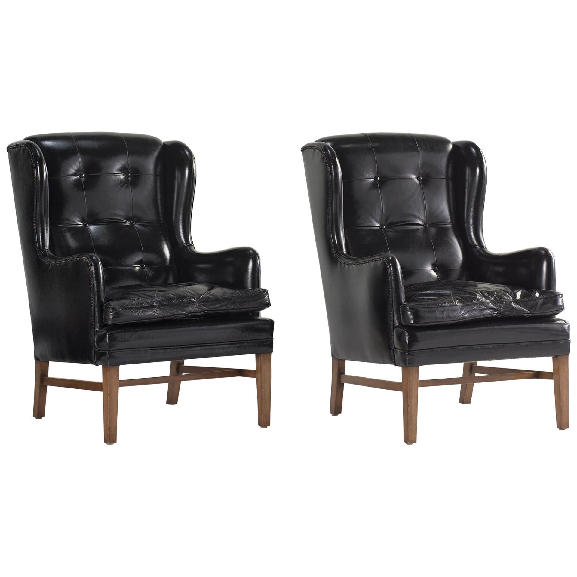 Black Leather Wing Armchairs, Sweden, circa 1950