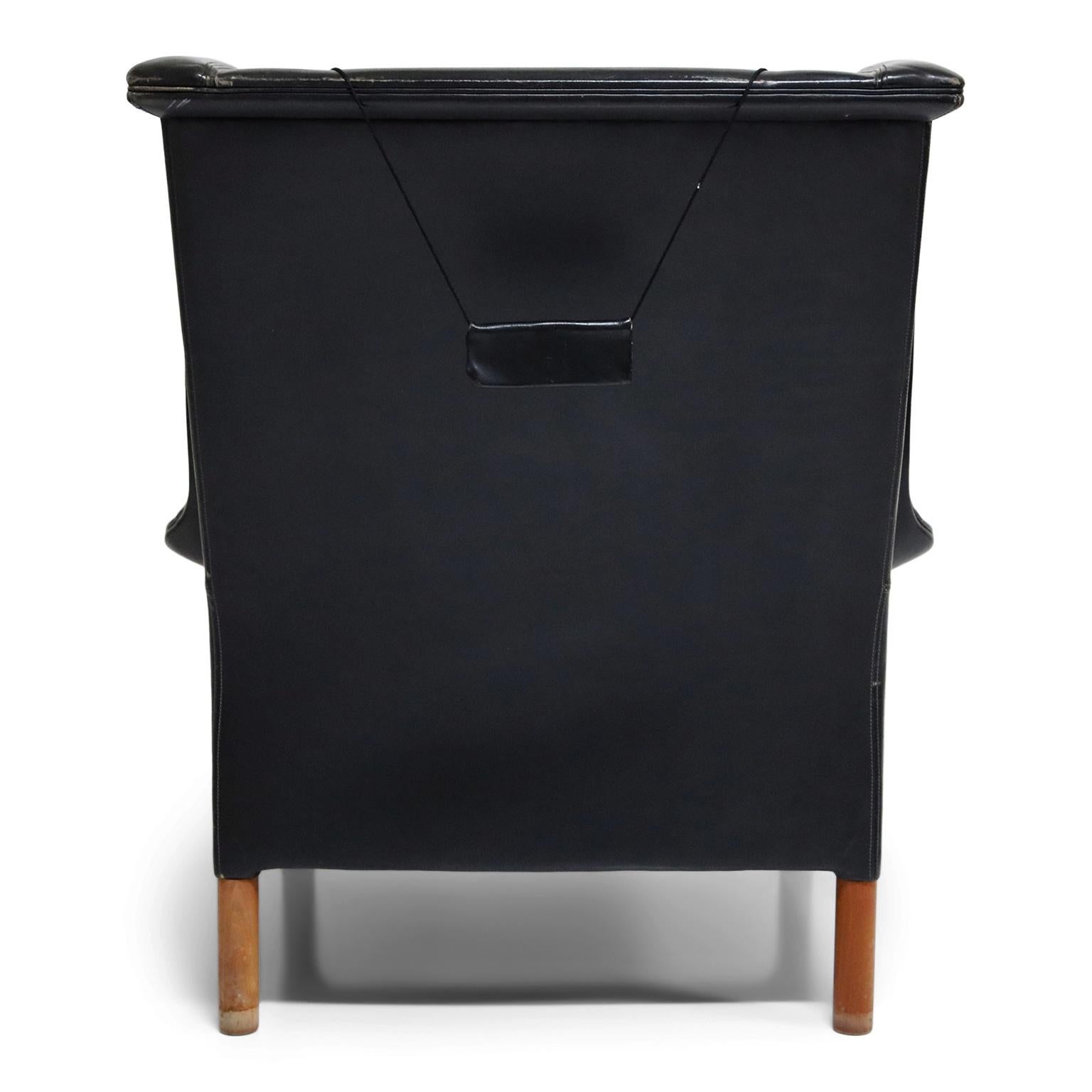 Mid-Century Modern Black Leather Wingback Armchair by Gerhard Berg for Stokke Fabrikker, circa 1965