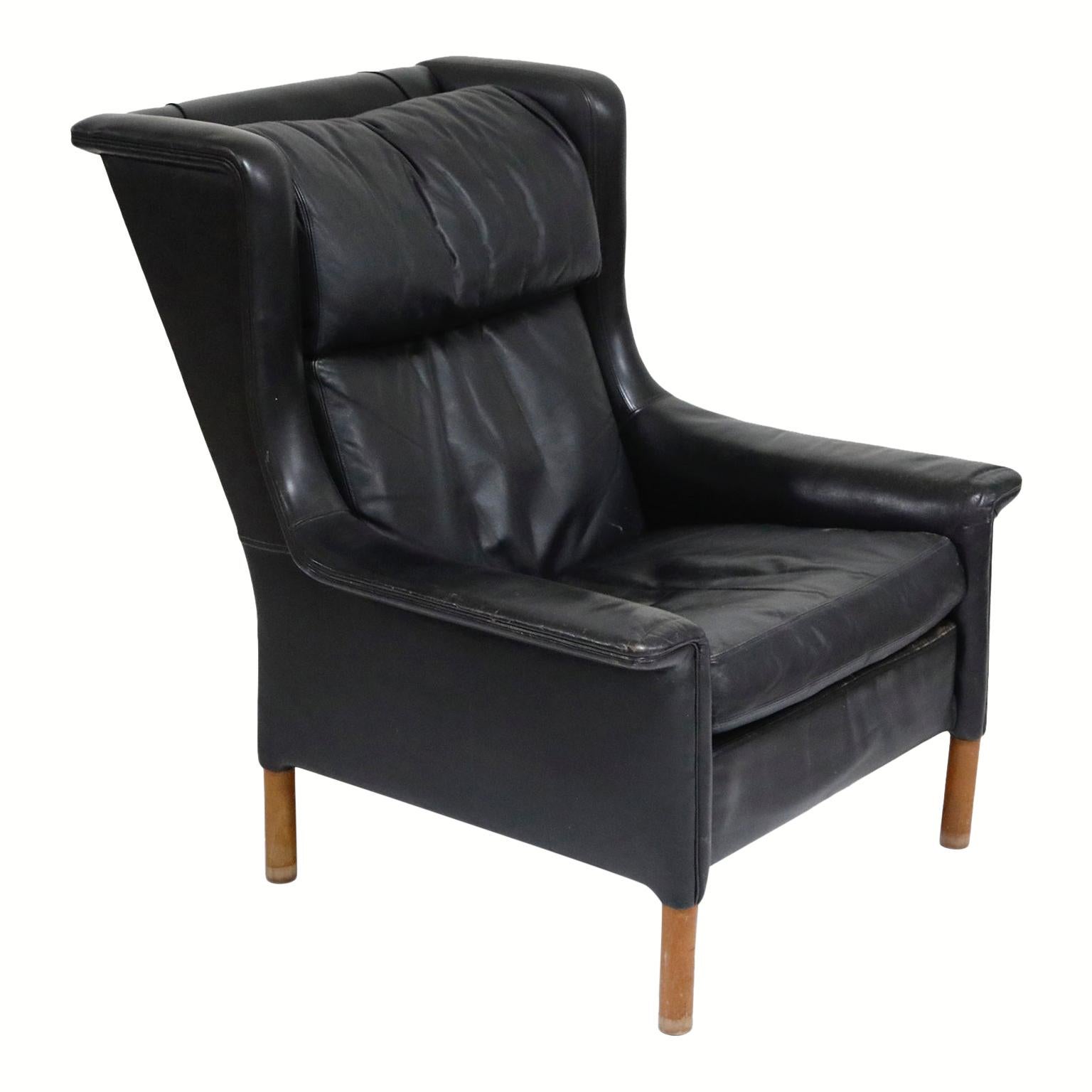 Black Leather Wingback Armchair by Gerhard Berg for Stokke Fabrikker, circa 1965