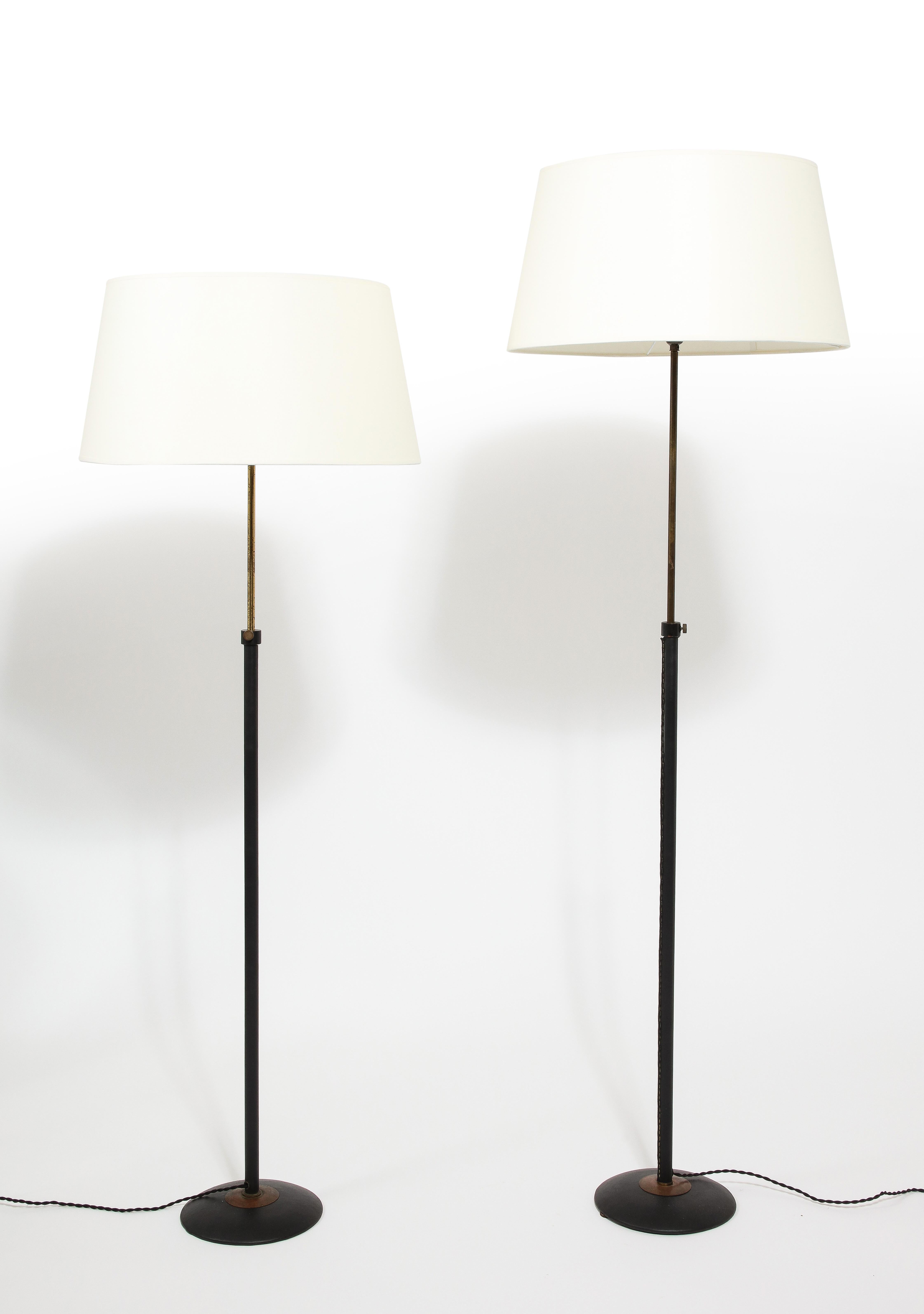Adnet Style Brass & Black Leather Wrapped Adjustable Floor Lamps, France 1960's In Good Condition For Sale In New York, NY