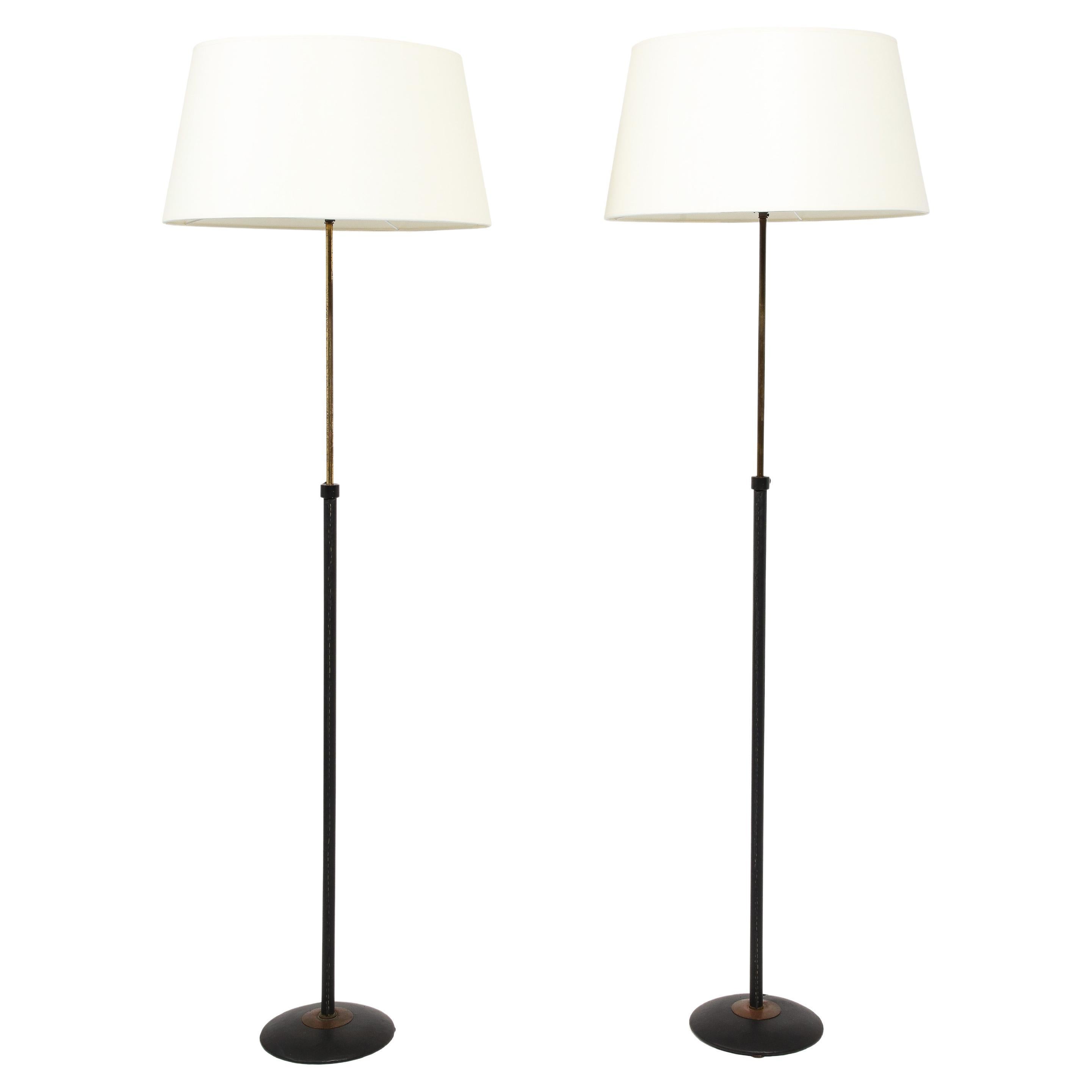 Adnet Style Brass & Black Leather Wrapped Adjustable Floor Lamps, France 1960's