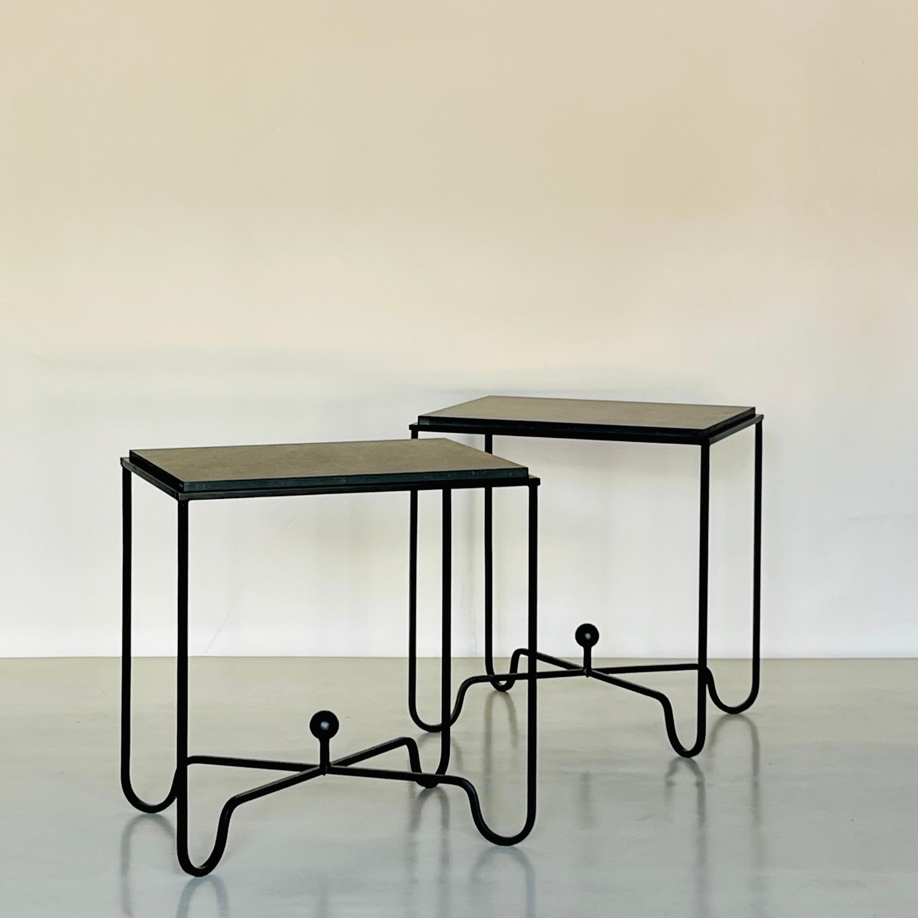 Sculptural blackened steel frames fitted with gorgeous black / anthracite limestone tops. Very durable stone surface.

Inspired by the timeless aesthetic of French modern design, these night stands / side tables / end tables from our exclusive