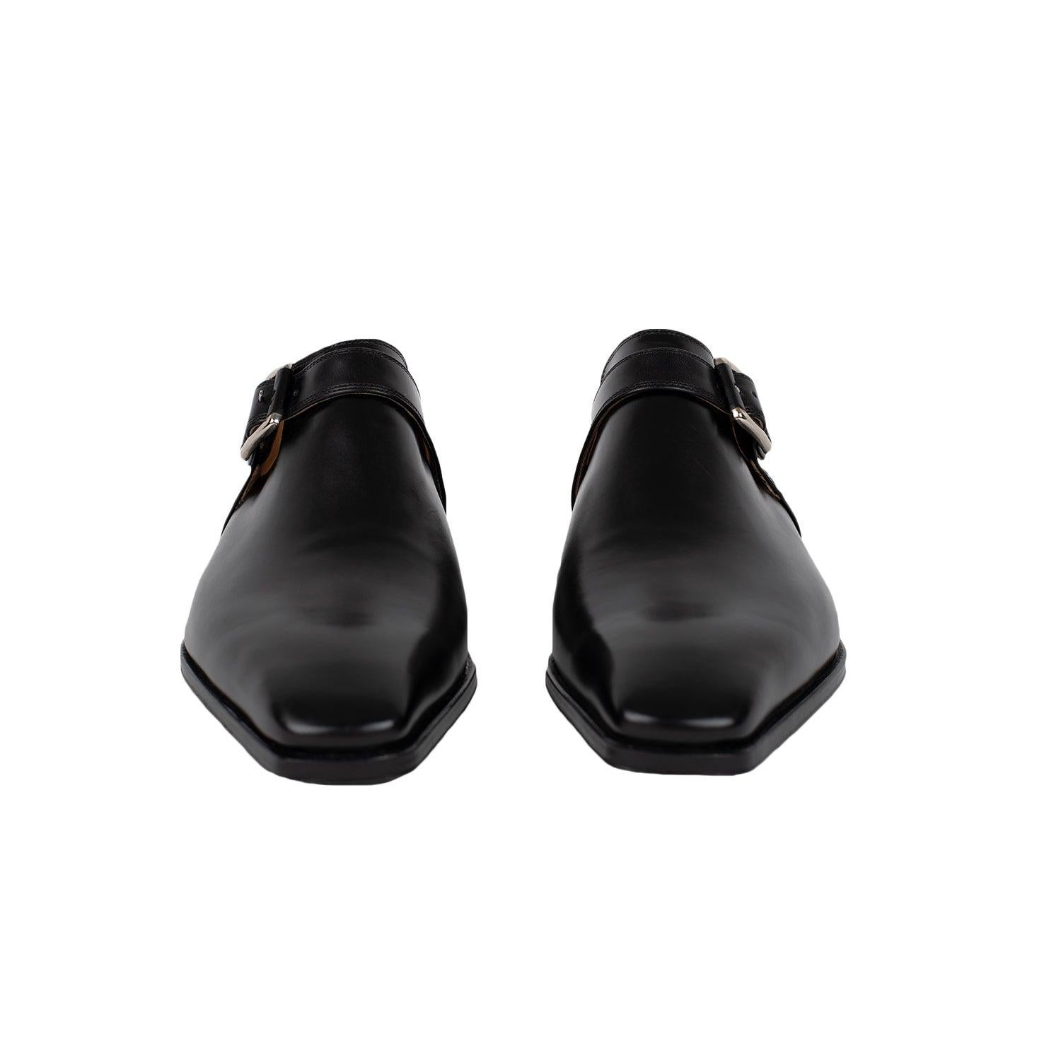 Elegante mocasín Artioli de cuero negro hecho a mano con hebilla plateada.
 
 Talón:3