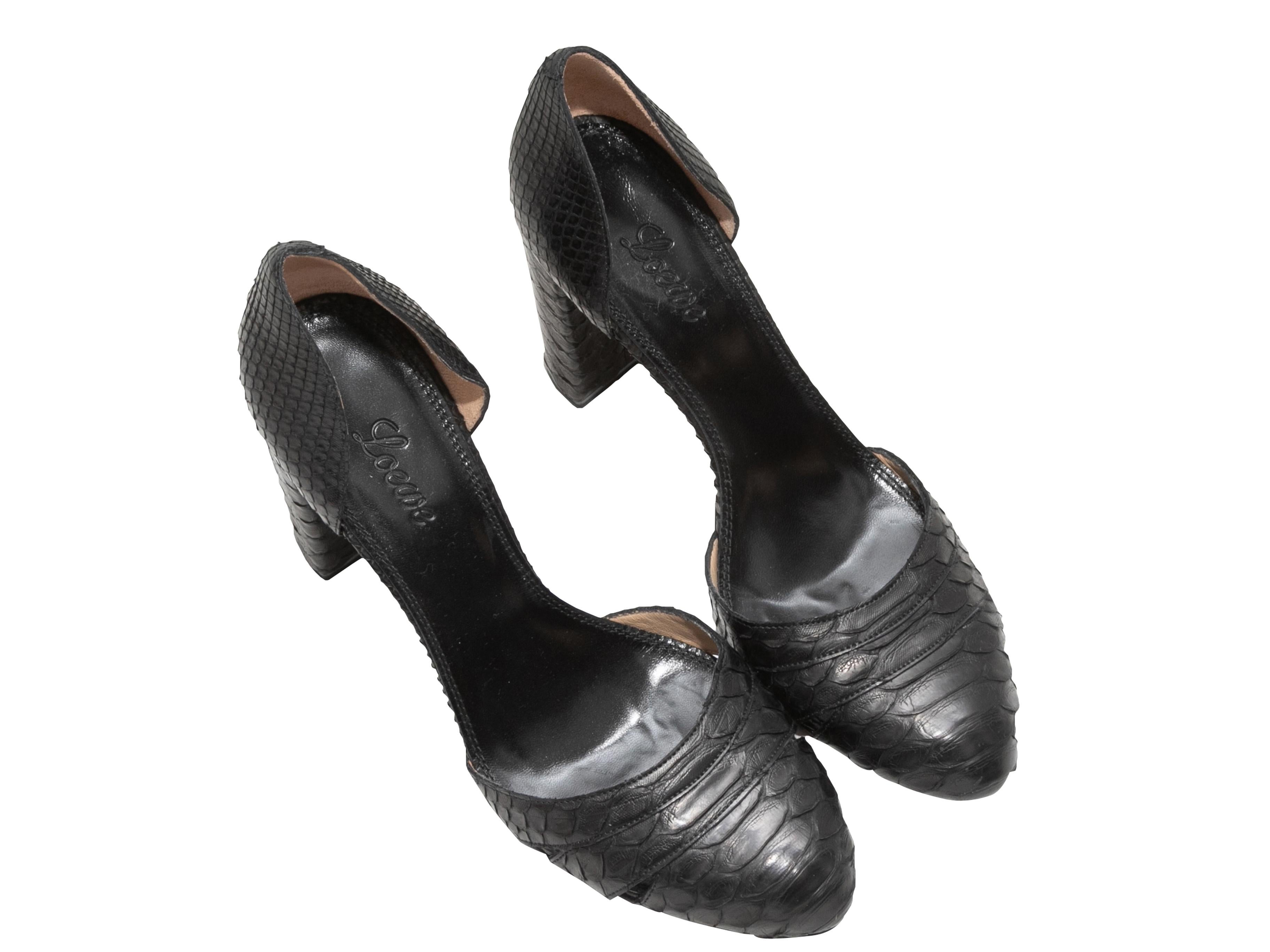 Product Details: Black snakeskin d'Orsay pumps by Loewe. Block heels. 4