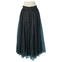 Black long skirt made of double lays of plumetis silk and tulle CHRISTIAN DIOR