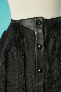Black long skirt made of leather, soft tulle and threads fringes Augustin Teboul