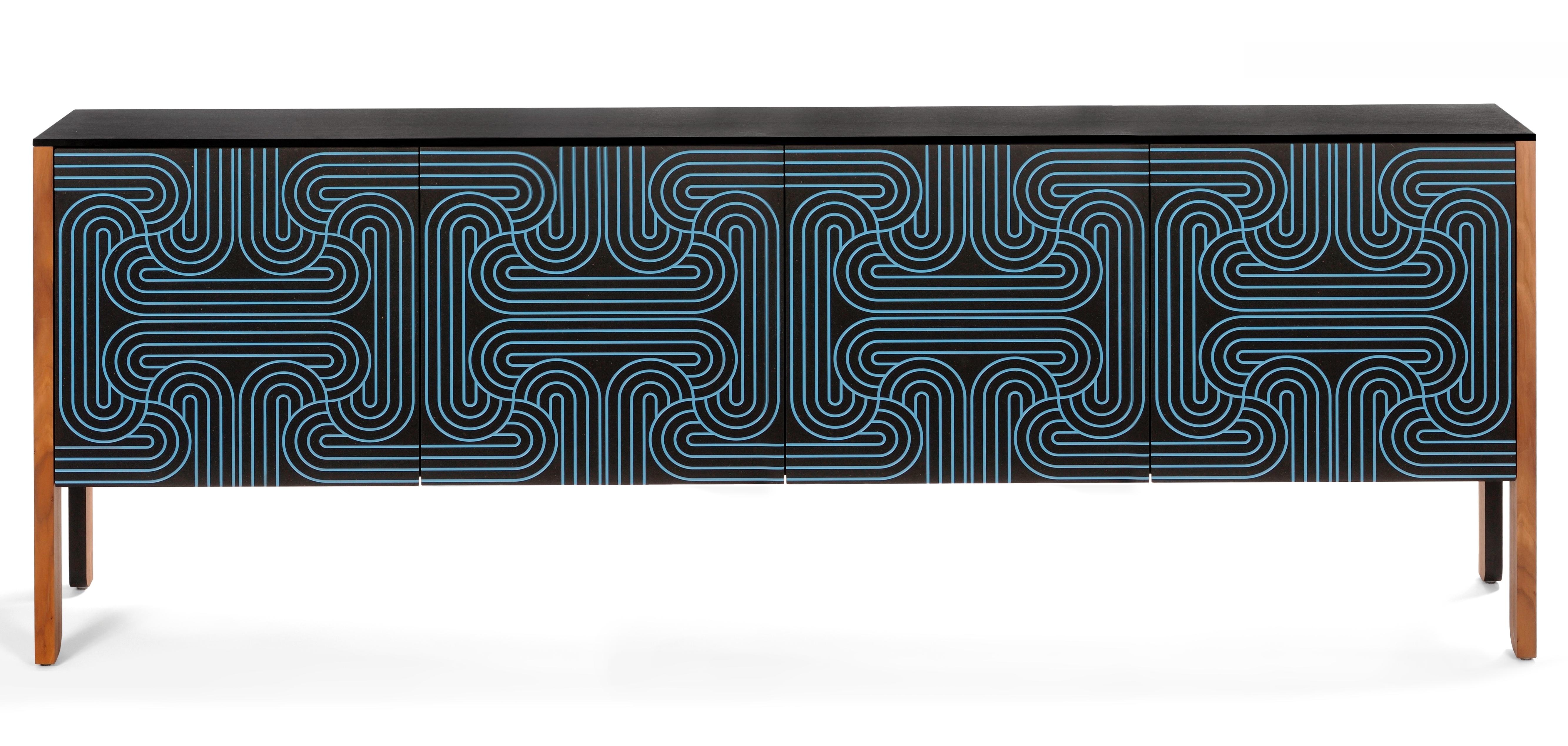 The stunning Loop sideboards are available in a range of colours, including this striking Black version.
The elegant Loop pattern is engraved by a CNC machine, onto the doors and handpainted in a choice of colours ncluding Gold, Blue, Dark