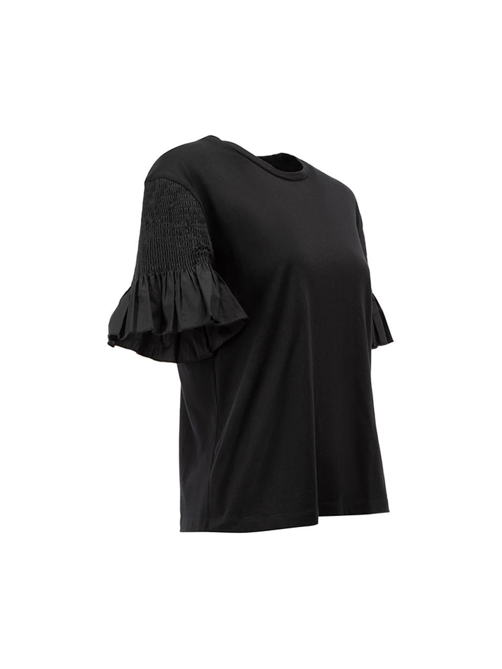 CONDITION is Very good. Minimal wear to t-shirt is evident. Minimal wear to the neckline where marks can be seen on this used Maje designer resale item. 
 
 Details
  Black
 Cotton
 T shirt
 Round neckline
 Short sleeves with shirring detail
 
 
