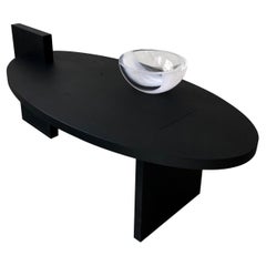 Table basse ovale "Lotus blanc" en chêne noir 