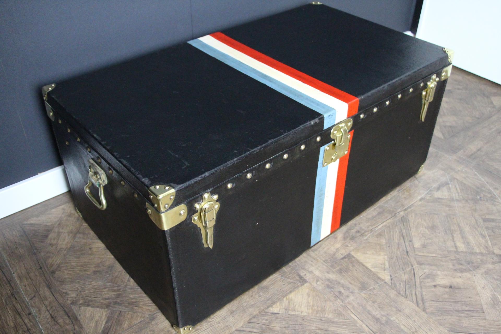 Beautiful and very unusual black waterproof canvas Louis Vuitton auto trunk featuring LV stamped solid brass locks, clasps and brass studs as well as brass and leather side handles. No initials.
It has got a very nice patina, and a gorgeous