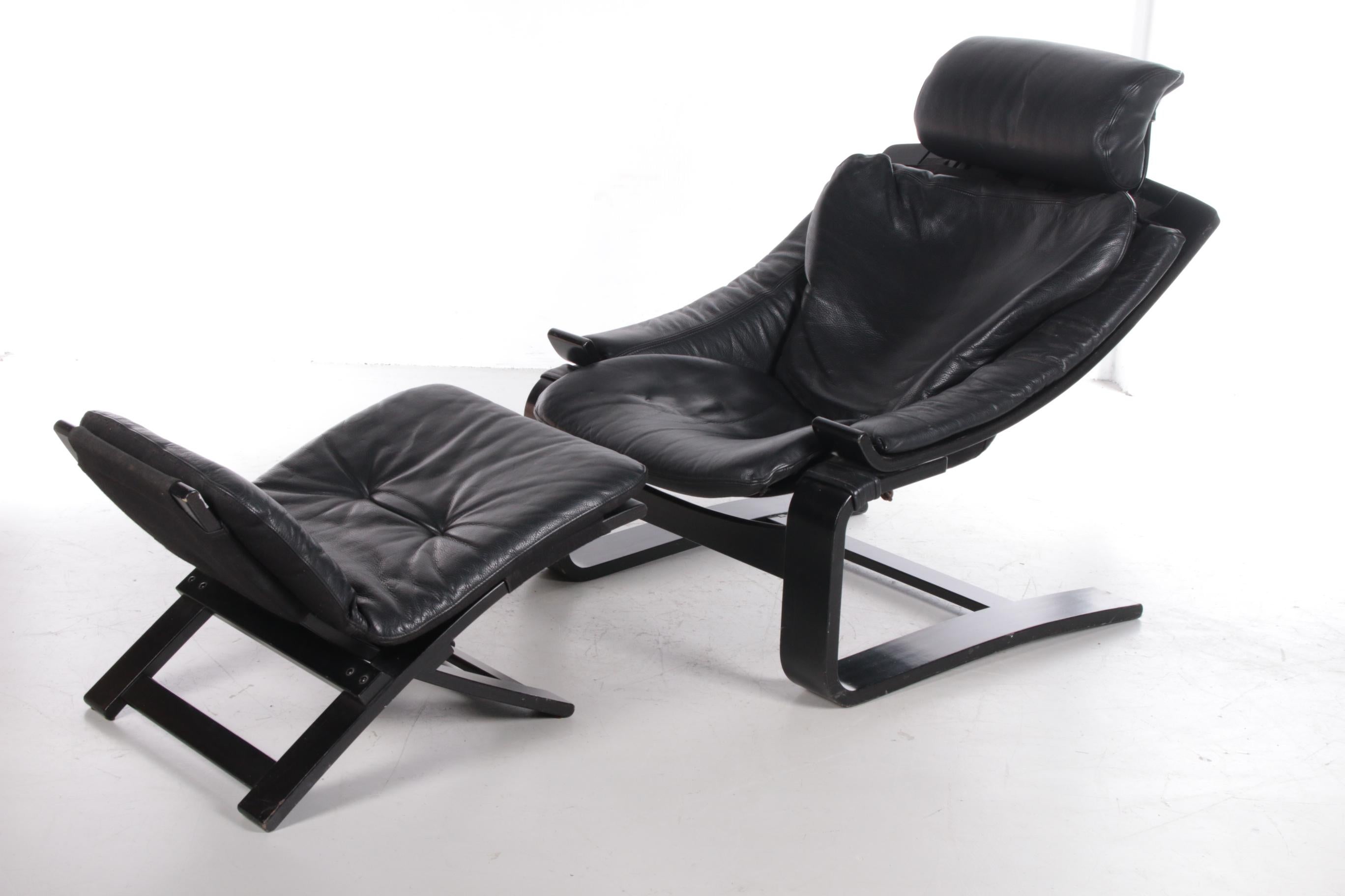 Mid-Century Modern Black Lounge Armchair and Footstool by Ake Fribytter for Nelo, Sweden